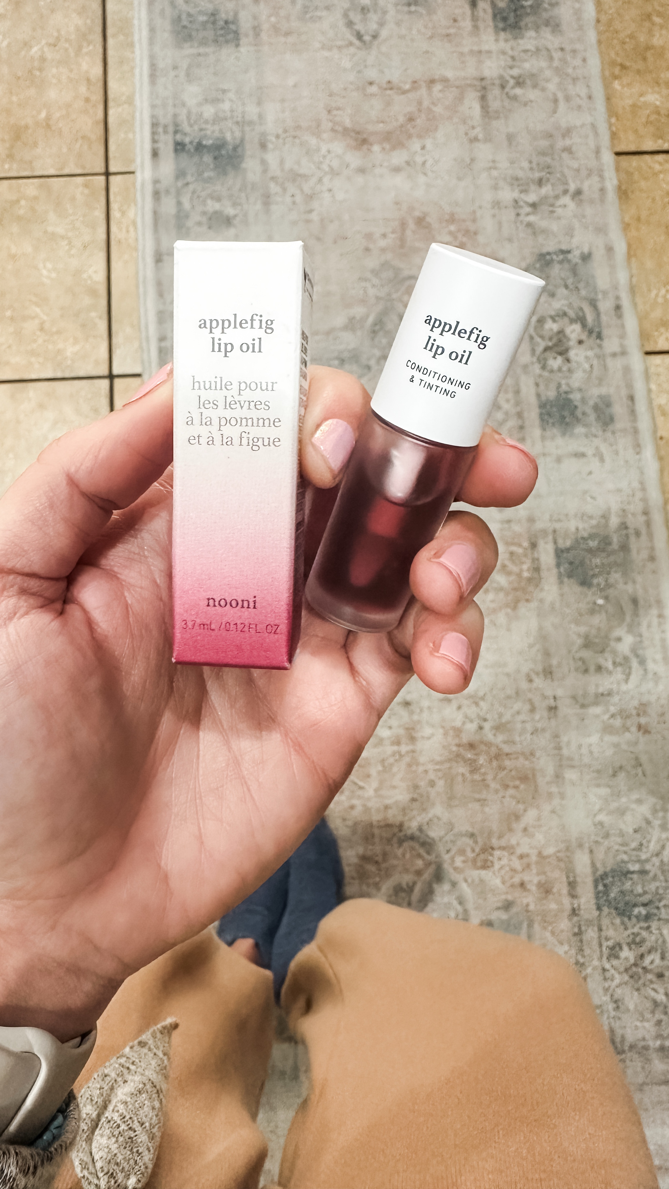 Loving this Nooni lip oil. It has Appleseed oil and fig extract and leaves your lips SO hydrated and smooth. It adds a subtle color and isn’t sticky or slimy. They have so many other shaped. Everything has Appleseed, and the extract depends on the shade you want. Highly recommend  

#LTKOver40 #LTKBeauty #LTKWatchNow