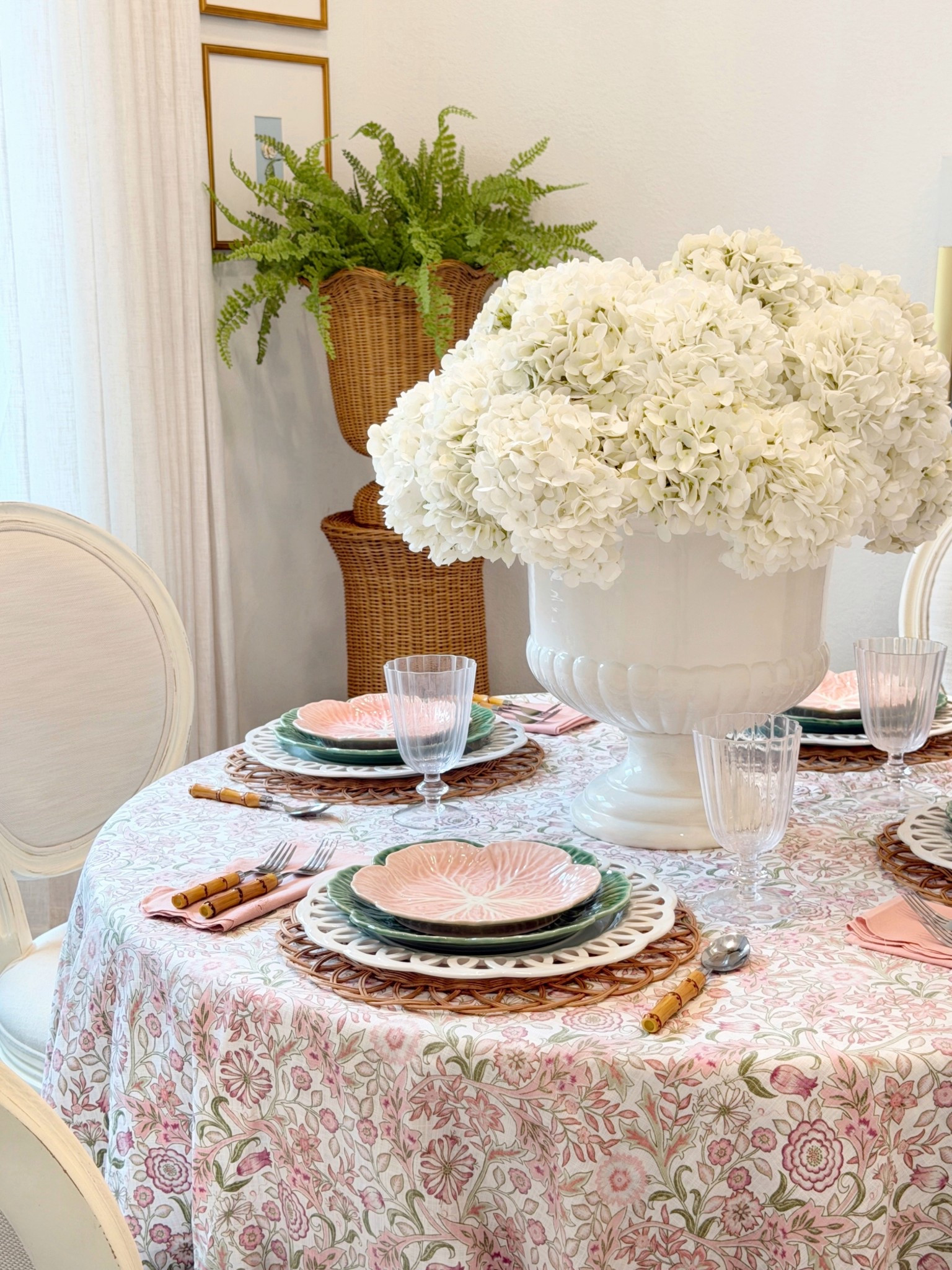 A little breakfast area refresh… moved the urns and pedestals in and hung new curtains—just need to give them a good steam before I share them (found a great deal on these viral curtains!!) I used 2 different types of hydrangeas from Amazon for this large arrangement 