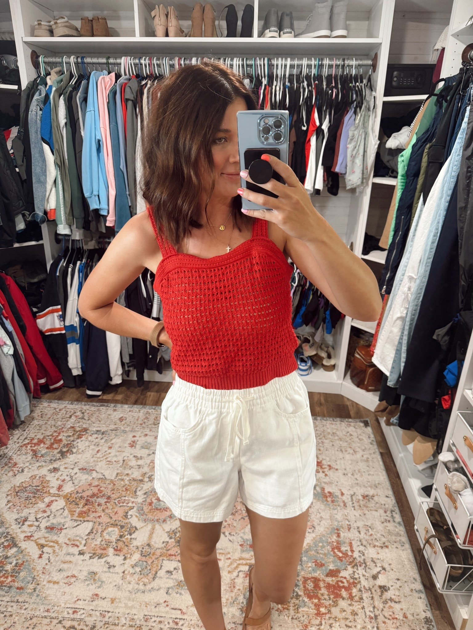 This outfit is so cute! Wearing a size medium in the shorts and a small in the tank 