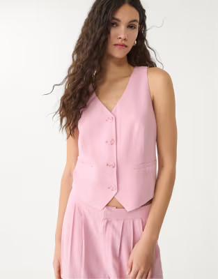 Stradivarius linen blend buttoned waistcoat in pastel pink | ASOS (Global)