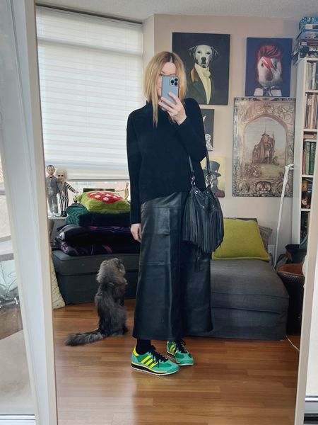 I’m wearing three current trends. One a midaxi (mid to maxi) length skirt in a column shape. Two, coloured sneakers. Three, is fringe. Here’s the thing, you can go as big or small as you want with trends. Coloured sneakers are a really easy way to add some visual interest if you love wearing black. If the thought of a fringe jacket or fringe skirt seems intimidating, try something small like this vintage fringe bucket bag. The most important part though is don’t feel like you have to dress trendy in order to be stylish or "cool", those things aren’t related. Only add trends if they feel right to your personal style. 
•
#winterlook  #torontostylist #StyleOver40 #90svintage #vintage70s  #secondhandFind #fashionstylist #slowfashion #FashionOver40  #MumStyle #genX #genXStyle #shopSecondhand #genXInfluencer #genXblogger #secondhandDesigner #Over40Style #40PlusStyle #Stylish40


#LTKstyletip #LTKover40 #LTKshoecrush