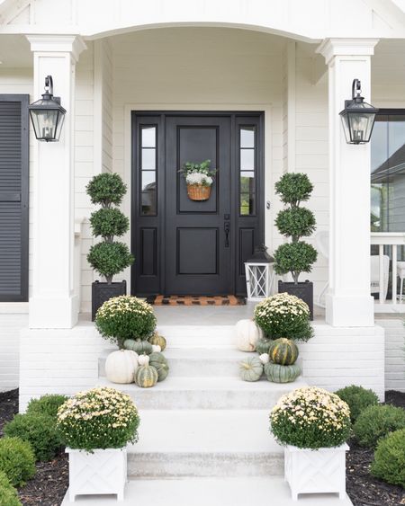Fall Front porch! Our topiary trees are the best quality and on sale today! #fall #frontporch #frontdoor #doormat #flowers 

#LTKSeasonal