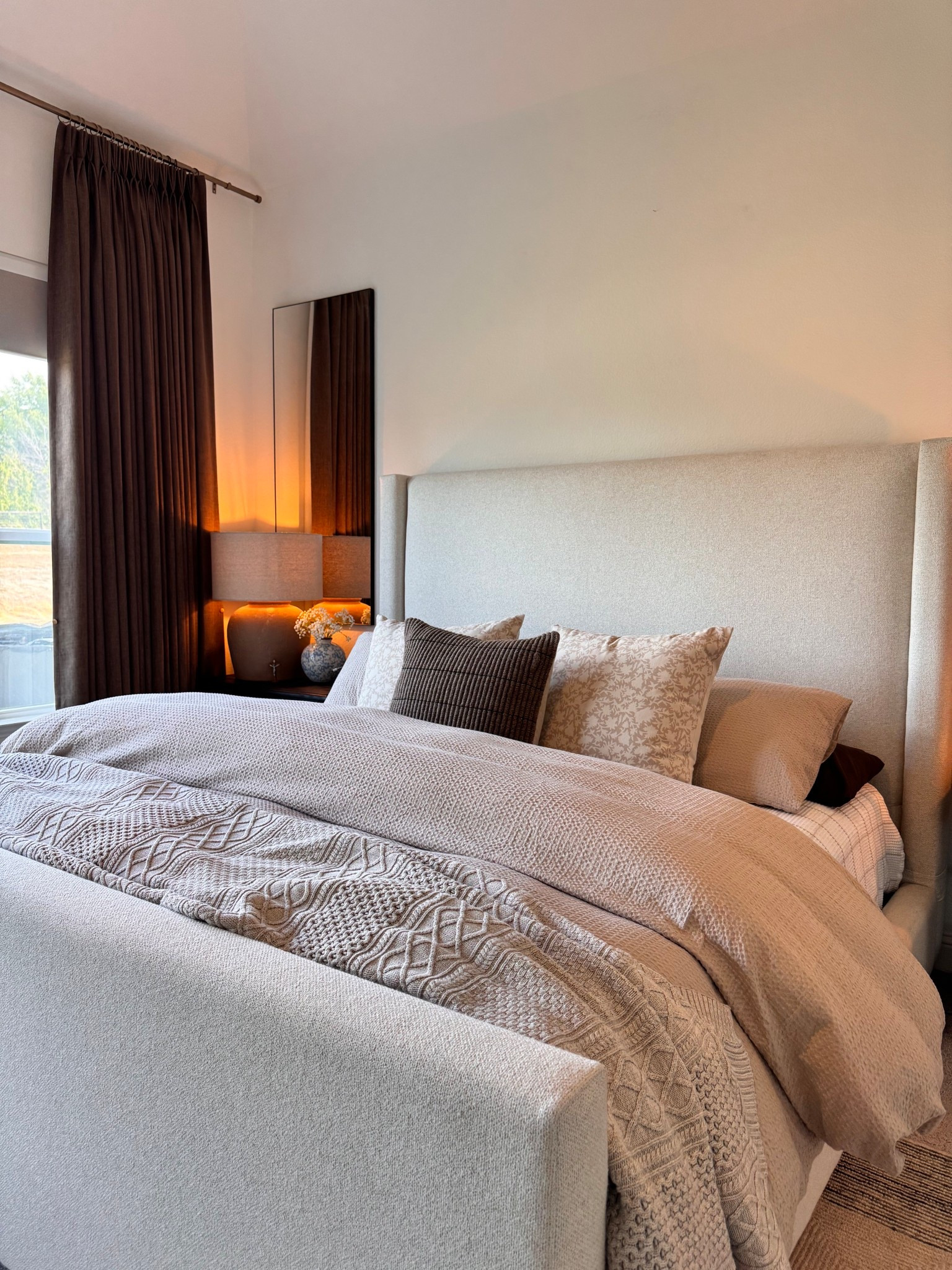 This bedroom has slowly become one of my favorite spaces in our home 🤍
Soft layers, warm neutrals, and pieces that make the room feel calm at the end of the day — nothing fussy, just comfortable and intentional.

I always gravitate toward bedding and furniture that feel timeless and inviting, the kind of pieces you don’t feel the need to constantly swap out. Everything here works together to create a space that feels restful, cozy, and lived in.

neutral bedroom, cozy bedroom ideas, timeless bedroom decor, layered bedding, classic bedroom style, warm neutral bedroom, master bedroom inspiration, bedroom decor ideas, upholstered bed, neutral bedding, calm bedroom aesthetic, traditional bedroom, transitional bedroom style, bedroom furniture inspiration, ltk bedroom finds

#LTKGiftGuide #LTKHome