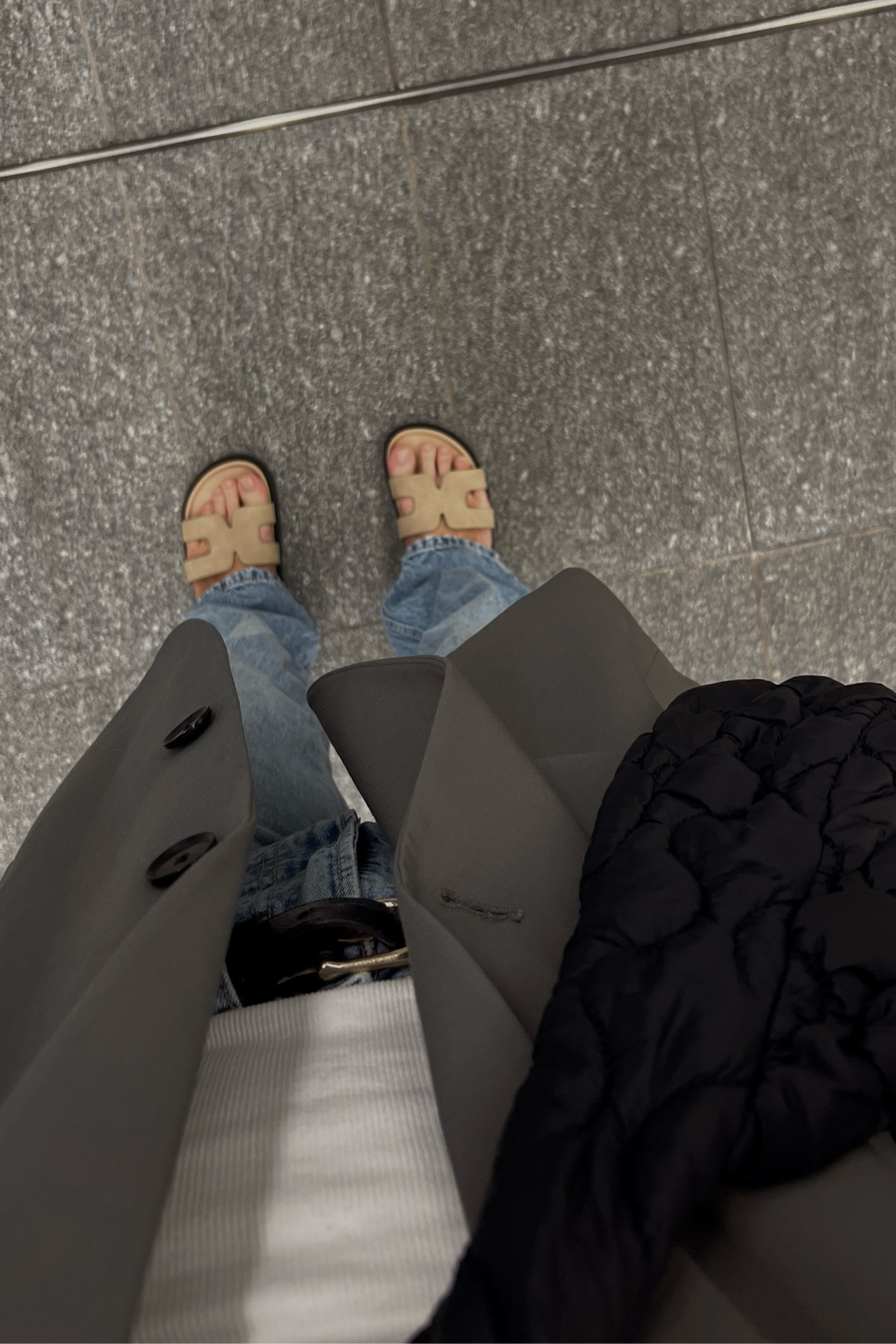 Hermes inspired sandal. Hermes inspired gladiator sandal. Light wash denim. Black puffy quilted crossbody bag. Spring shoes. Spring and summer sandals. Minimal style. Basic minimal outfit. Neutral outfit. Beige sandal. Suede sandal. Ego Hermes inspired sandal. 

#LTKFindsUnder50 #LTKShoeCrush