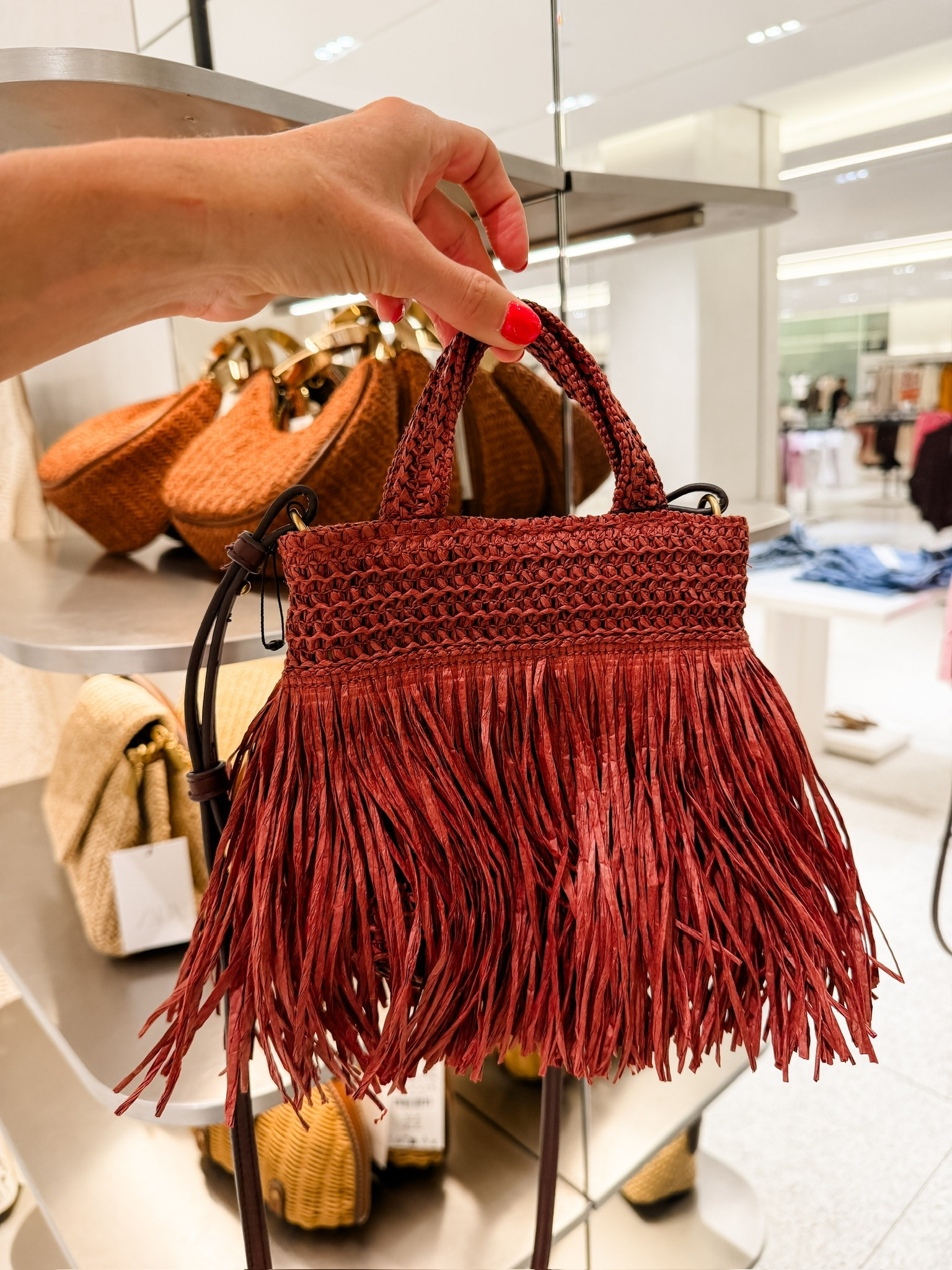 How cute is this fringe purse?! This would be so great to bring on vacation!

Loverly Grey, Zara, vacation finds, red fringe purse