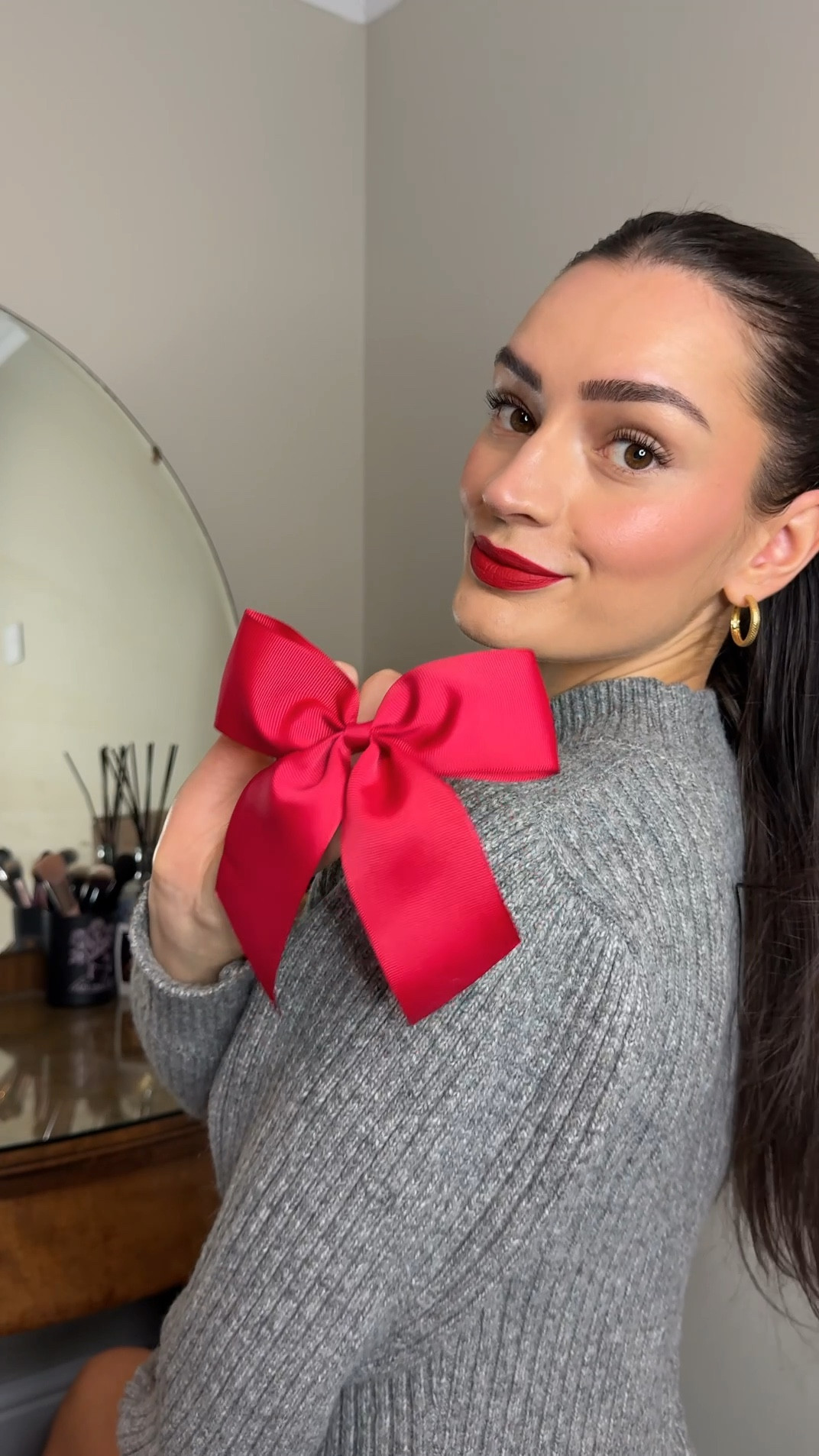 Easy festive hairstyle, half-up with a red bow 🎀

#LTKgrwm #LTKpartywear
