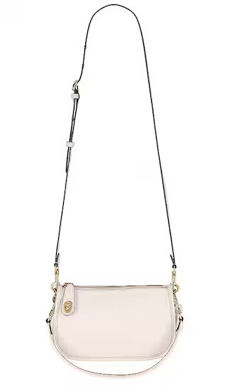 Coach Swinger Bag in Cream. | Revolve Clothing (Global)