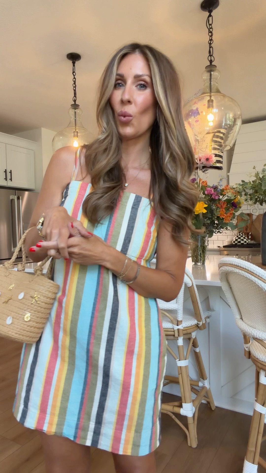 We love a good affordable fine. This is one of my favorite dresses that was previously in red white and blue. They’re both still available but now in this pretty summer stripe if it’s so good you’re gonna want it for the remainder of the summer you can wear it literally anywhere tons of sizes and I’m in a medium.

#LTKmomlife #LTKootd #LTKOver40