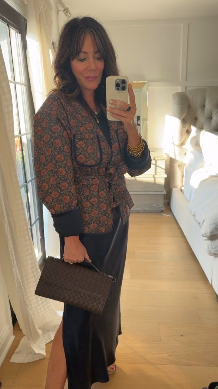 The feel of this quilted belted puffer jacket is so luxe with the silk navy lining. Tap on the link below to see the color version wearing.  Wearing size small and cuffed up the sleeves so that it reveals the navy lining that matches my dress.  I also saw matching pants and a dress to this jacket

#LTKOver40 #LTKTravel #LTKNYFW