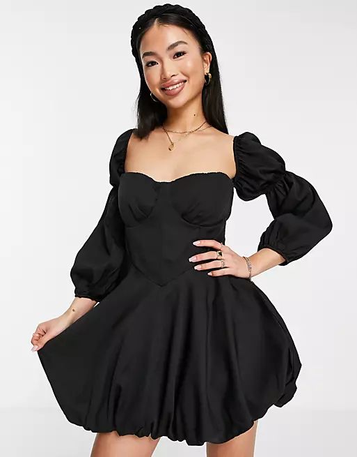 In The Style x Lorna Luxe corsetted puff ball volume sleeve mini dress in black | ASOS (Global)