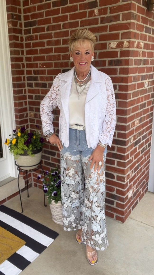 Silky Sleeveless Blouse
Lace and Rhinestone Jeans
Lace Bomber Jacket
