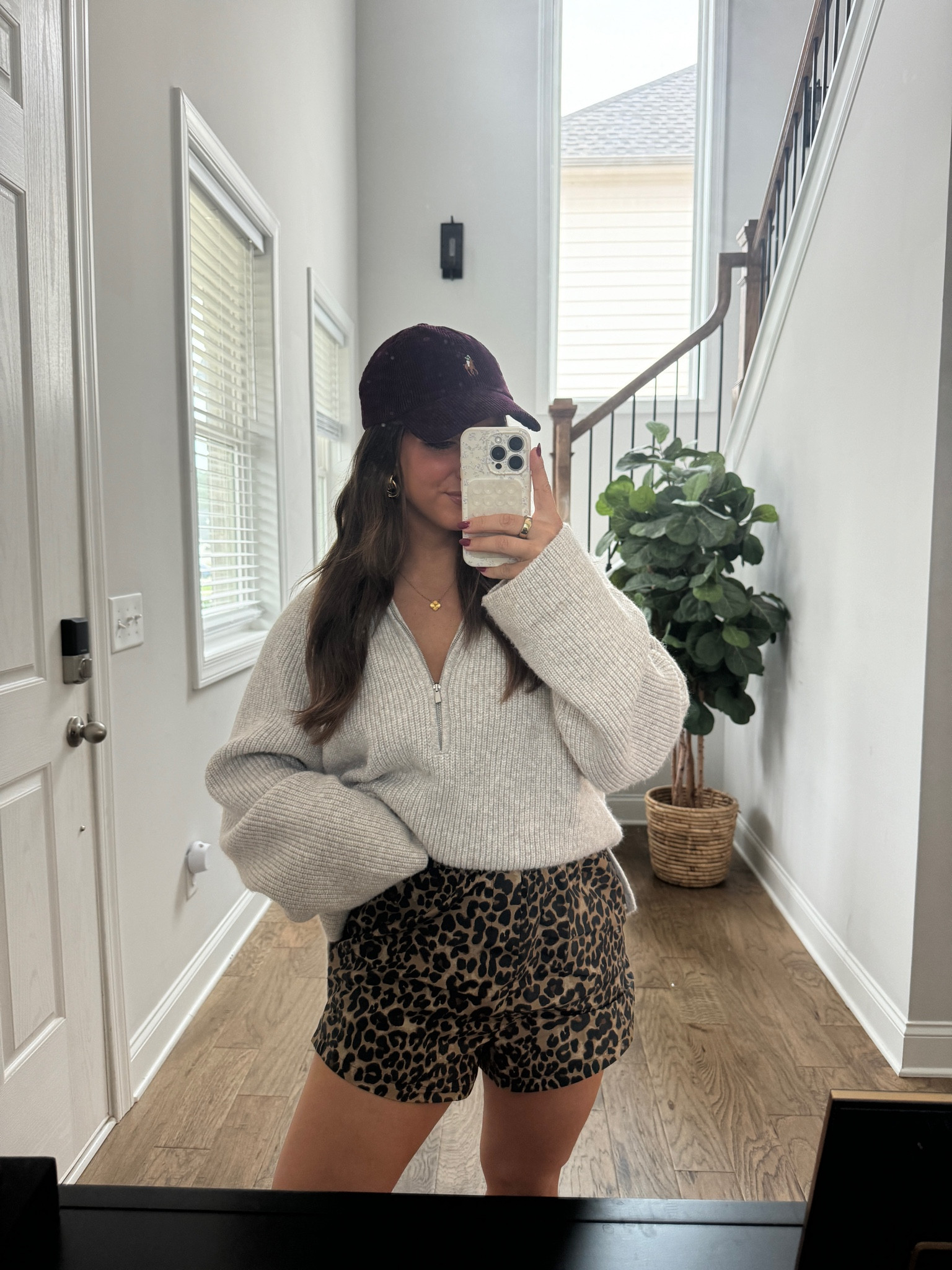 Casual Friday outfit with my favorite quarter zip sweater & cheetah shorts!