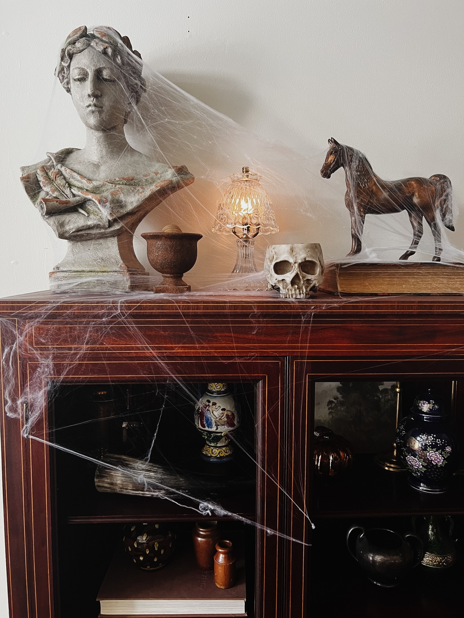 Creepy chic Halloween is underway over here! 💀 I don’t usually buy mass produced decor, but for $12, this skull is really realistic, heavy, and will last for years to come. I actually ordered a second one. This skull with some cobwebs gives great impact with minimal effort. Highly recommend !

#LTKHoliday #LTKHalloween #LTKSeasonal