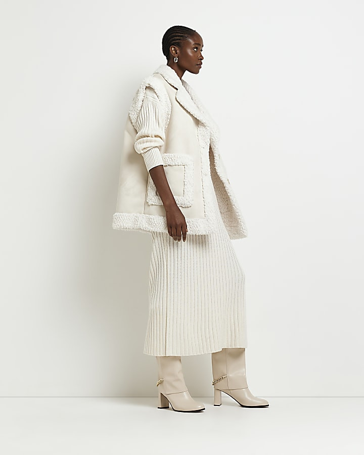 Beige faux shearling gilet | River Island (UK & IE)