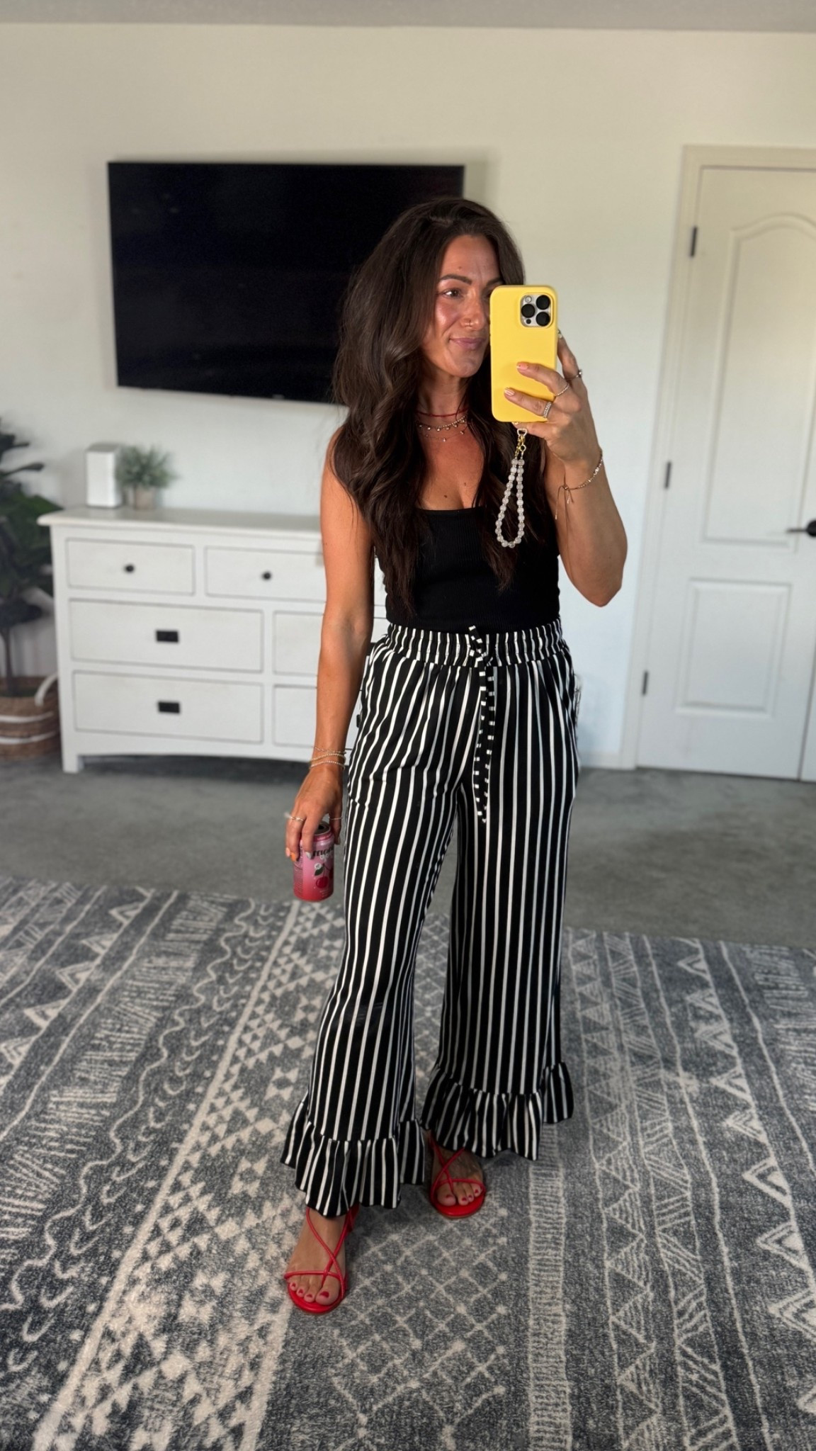 Ootd. Obsessed with these pants-so cute with the ruffle, but way soft and comfy! Tanks have a built in bra and I’ve had for years! Both true to size

#LTKootd #LTKWorkwear #LTKPetite