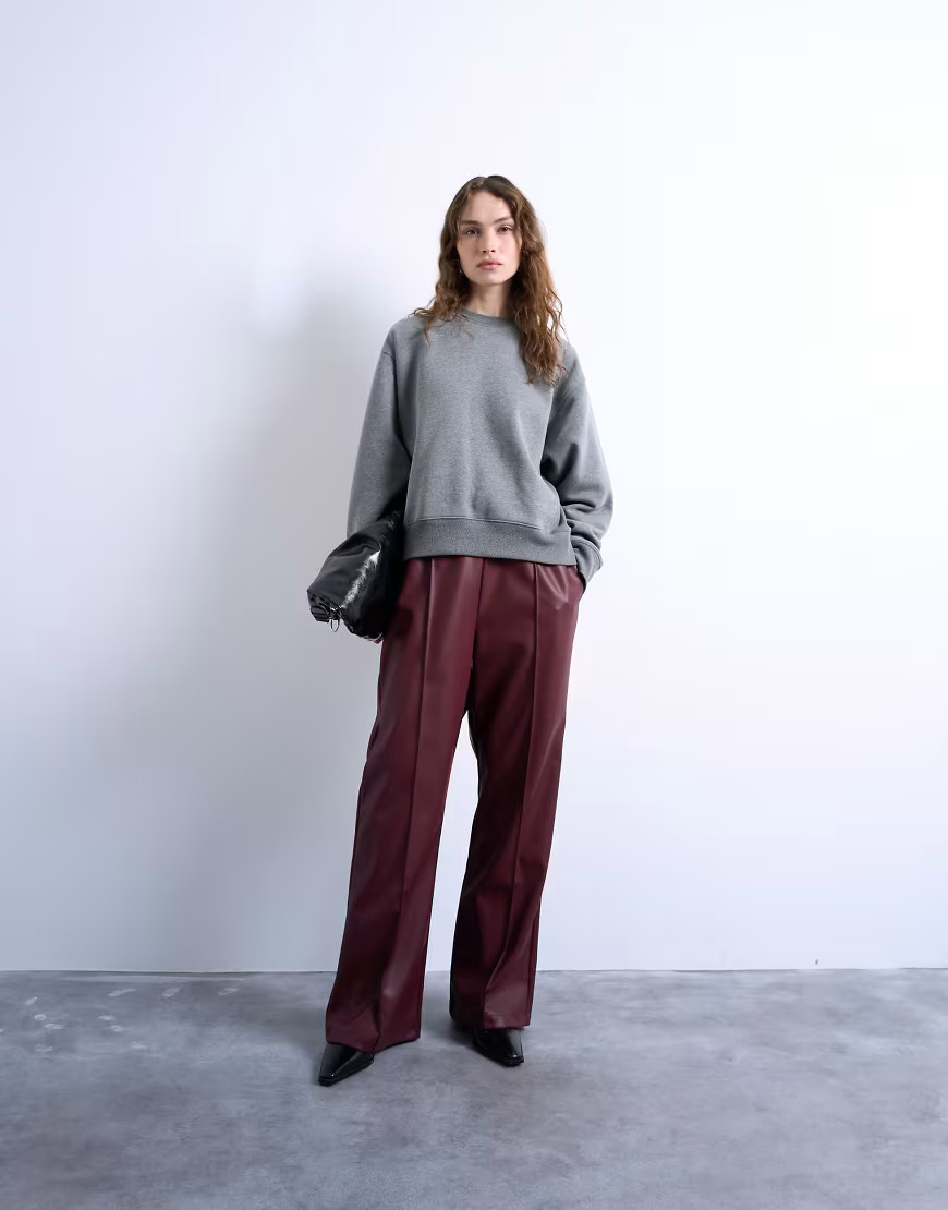 Topshop faux leather wide leg sweatpants with pinseam detail in burgundy-Red | ASOS (Global)