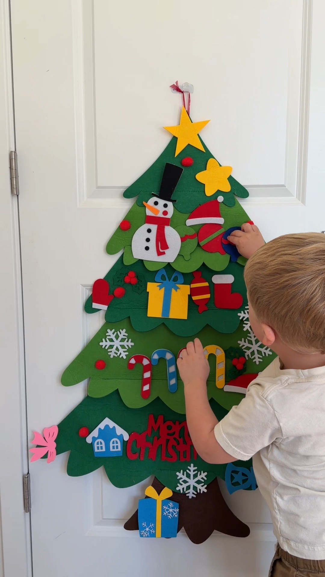 A fun Christmas activity to do with kids and make it a new family tradition! #christmasactivitiesforkids #felttree #kidschristmas #christmastradition 

#LTKHoliday #LTKFamily #LTKKids