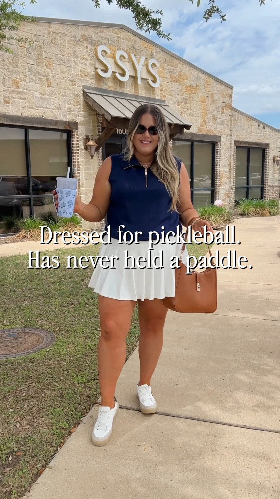 Pickleball outfit aesthetic but I don’t even play 🎾 This navy zip-up sleeveless top + white pleated skirt combo is my new summer uniform. Sporty, cute, and works for everything from errands to actually looking like you have a hobby. All pieces are from SSYS — true to size, runs TTS. Linking everything including the bag and sneakers!

#LTKootd #LTKMidsize #LTKActive