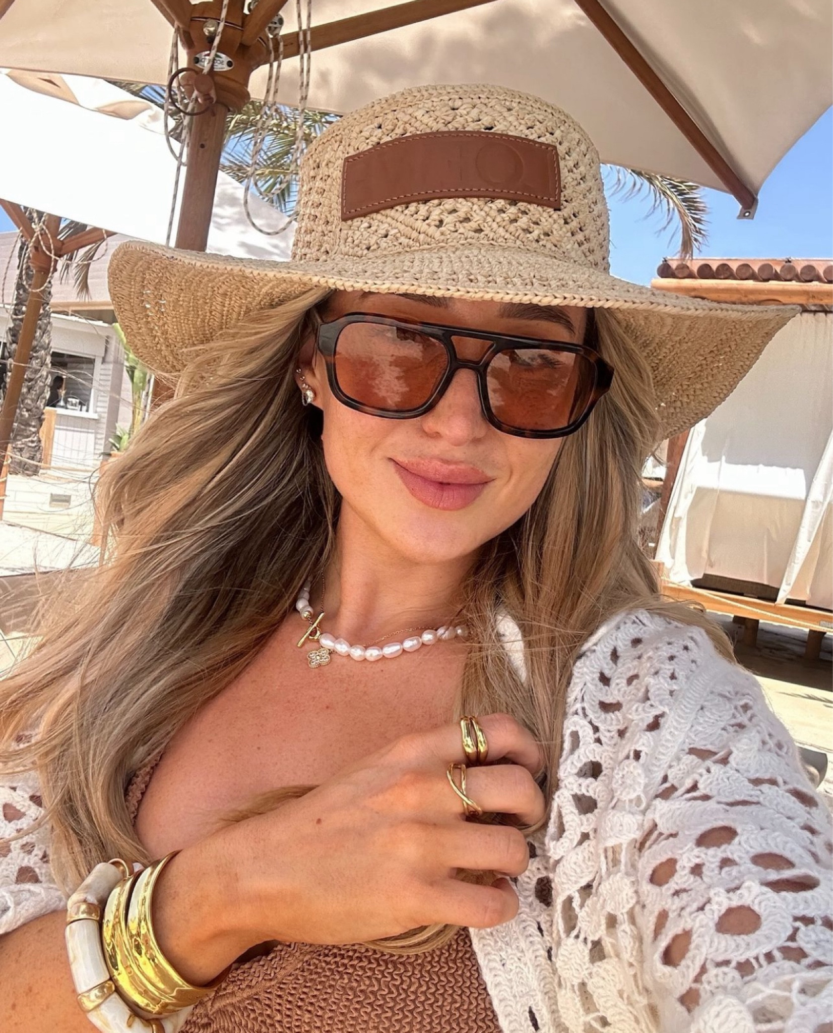Gold and neutrals details - summer rattan beach hat from Loewe, gorgeous gold and Pearl jewels from Pandora, Hunza G swimsuit, crochet shirt and brown sunglasses 

#LTKluxury #LTKeurope #LTKsummer
