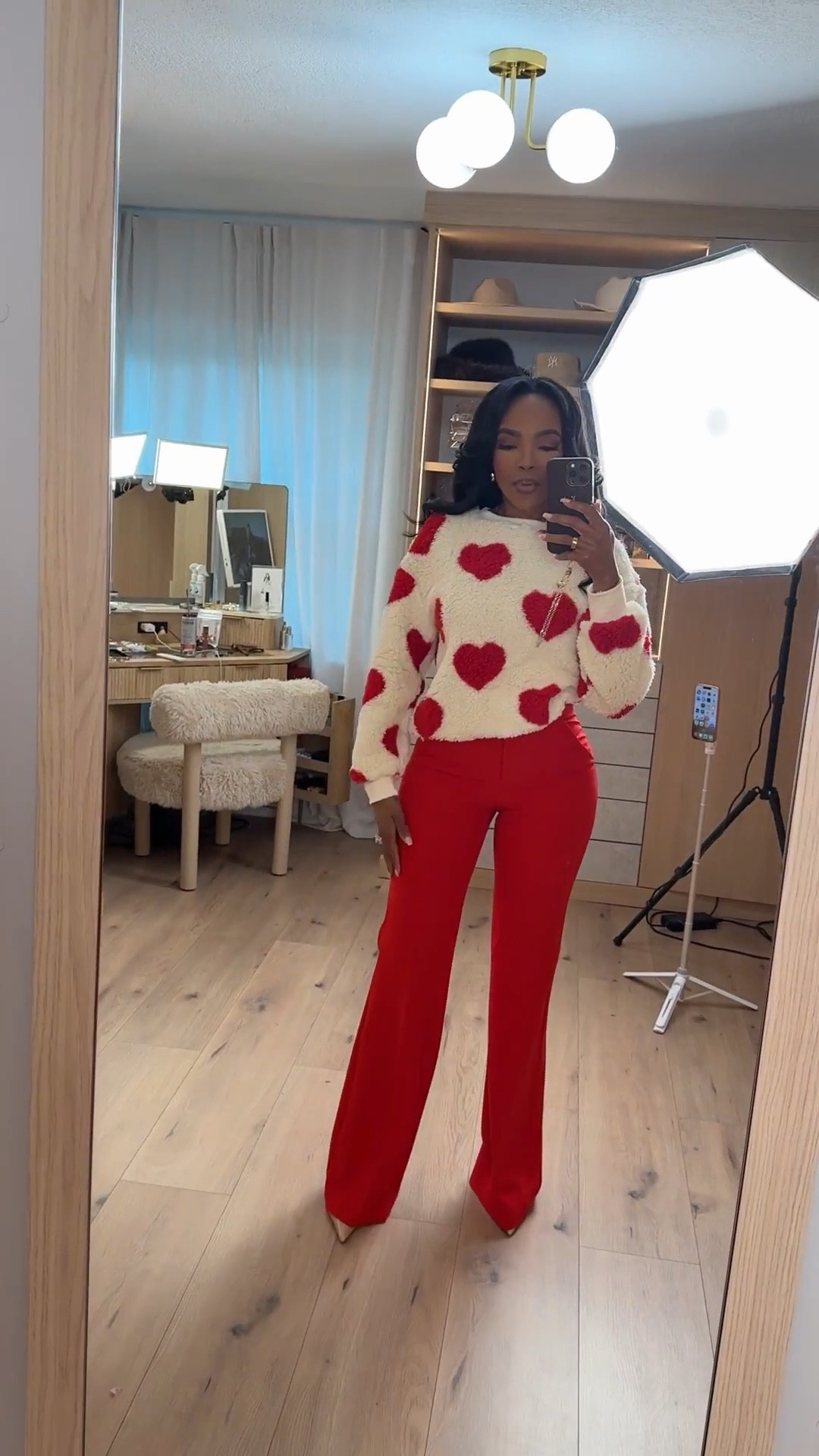 This heart sweater + red pants combo is giving fun, confident, and main-character energy ❤️  
Easy to style, super flattering, and such a good statement look without trying too hard.

Perfect for Valentine’s plans, date night, girls’ night out, or anytime you want a bold pop of color.

📏 Sizing:
Sweater: Size Small  
Pants: Size 27 Long  
Heels: True to size  

heart sweater outfit, Valentine’s Day outfit, red pants outfit, chic winter look, feminine statement outfit, date night style, dressy casual women’s fashion

Follow me on Instagram and YouTube @kirasfashionfinds

#LTKgrwm #LTKvlog #LTKValentine