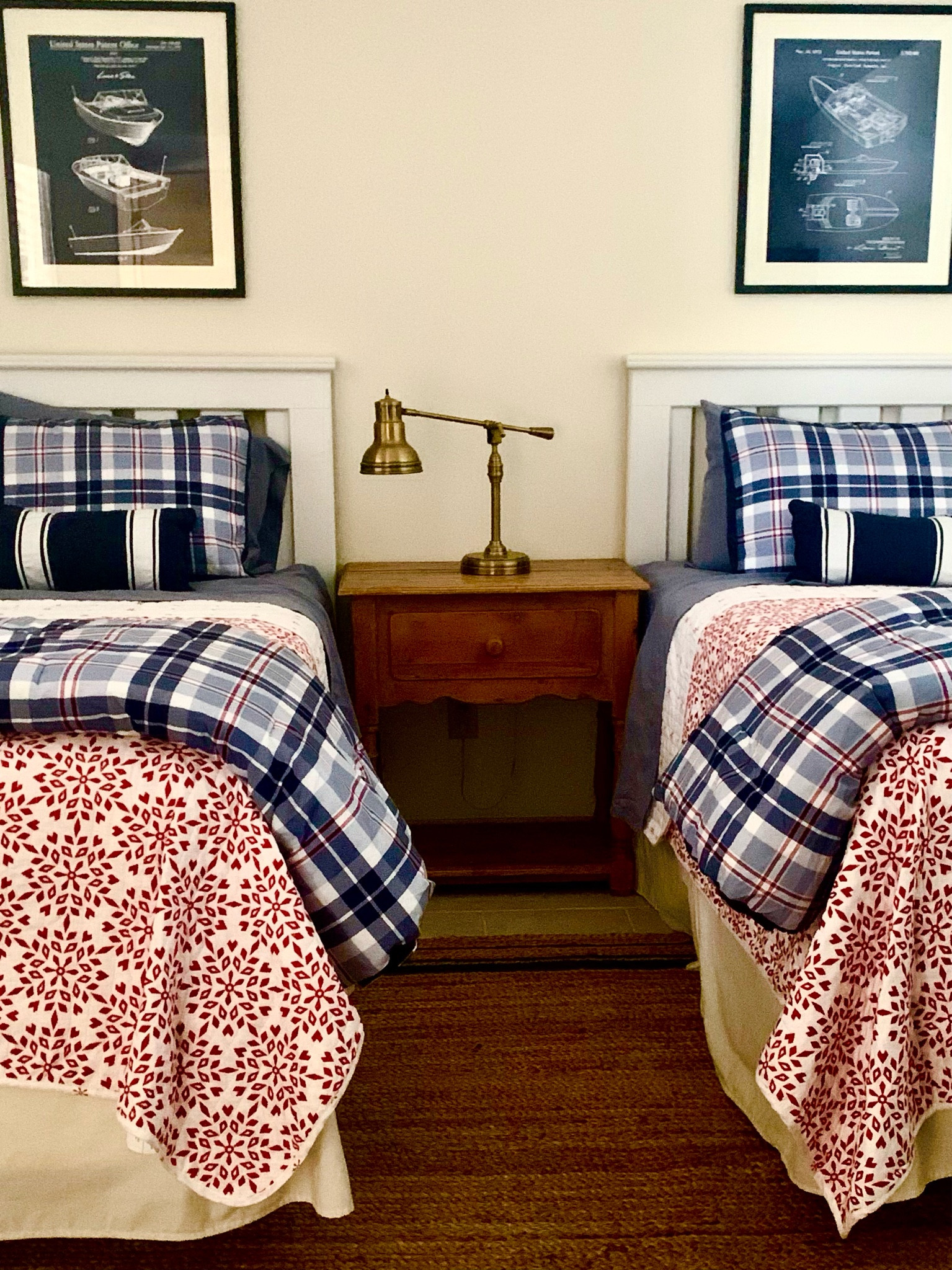 Lake bedroom, nautical prints, twin beds, classic decor, red and blue decor, jute rug

#LTKhome