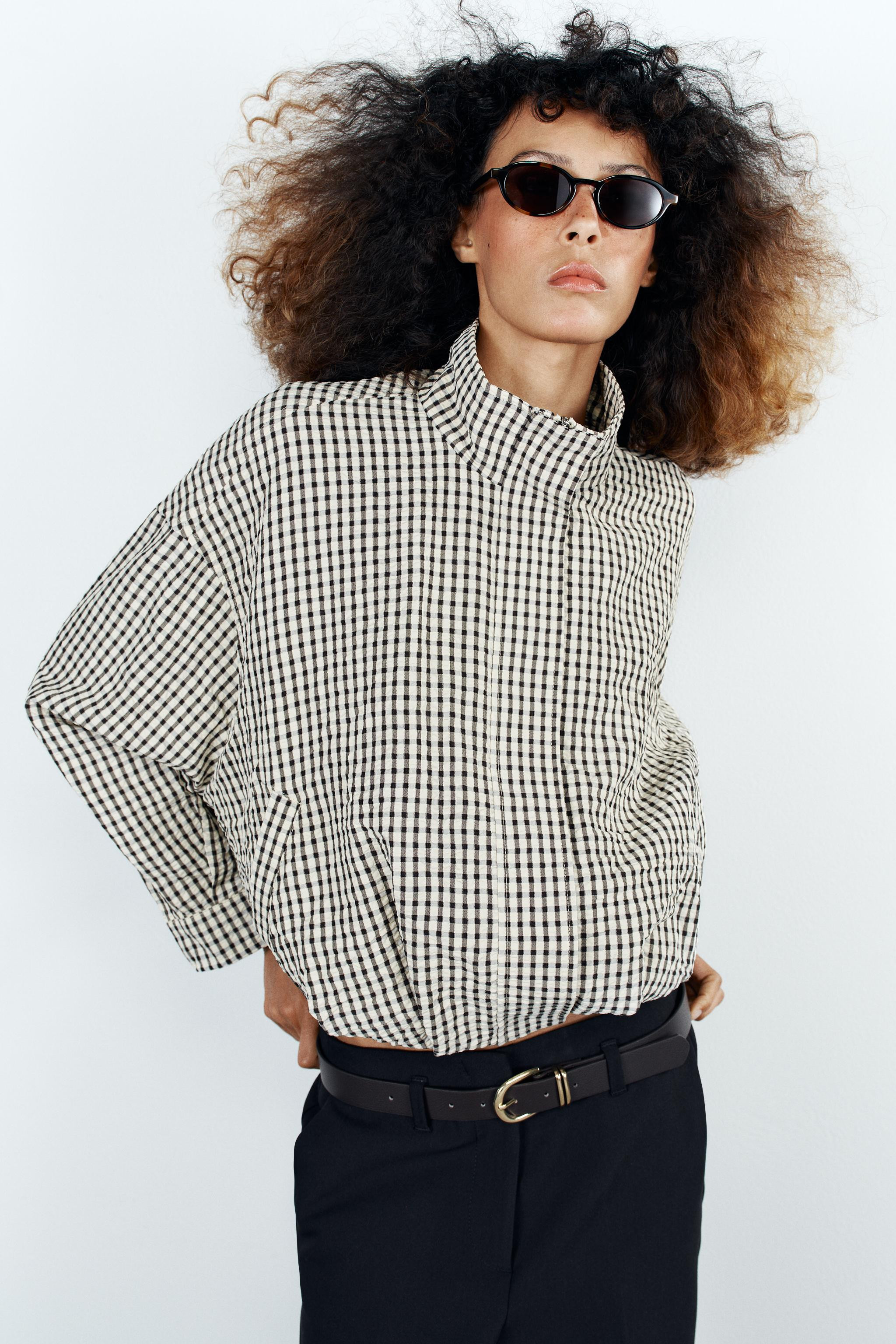 Bomber jacket with a high neck and long sleeves. Featuring front welt pockets, a puffy hem with f... | Zara UK
