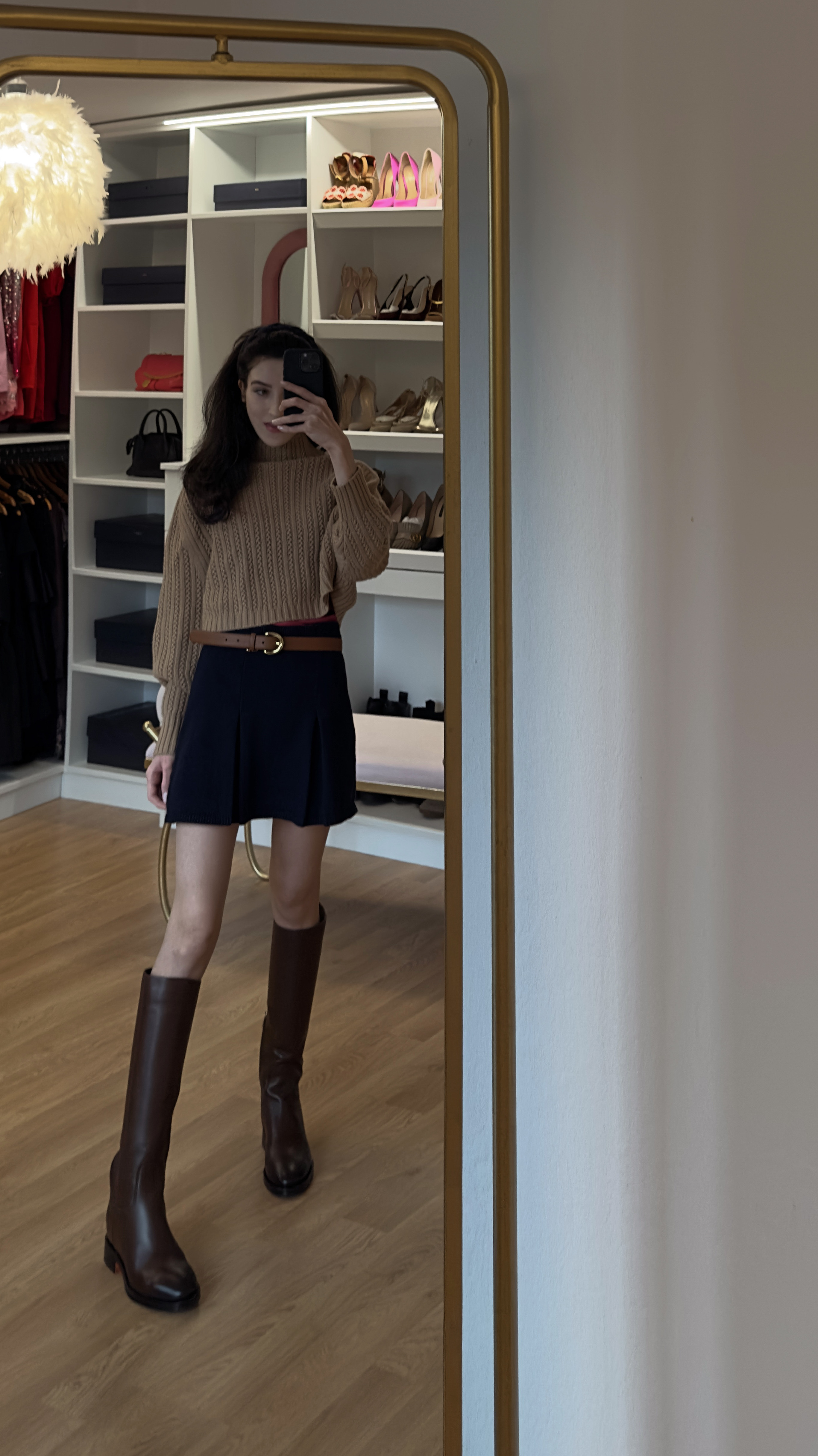 sweater and skirt outfit, tan knit sweater, navy pleated skirt, fall preppy style, knee high boots outfit, autumn layering ideas, belted skirt look, cozy chic fashion, classic fall aesthetic, structured skirt styling 

 #LTKdayinmylife #LTKootd #LTKSeasonal
