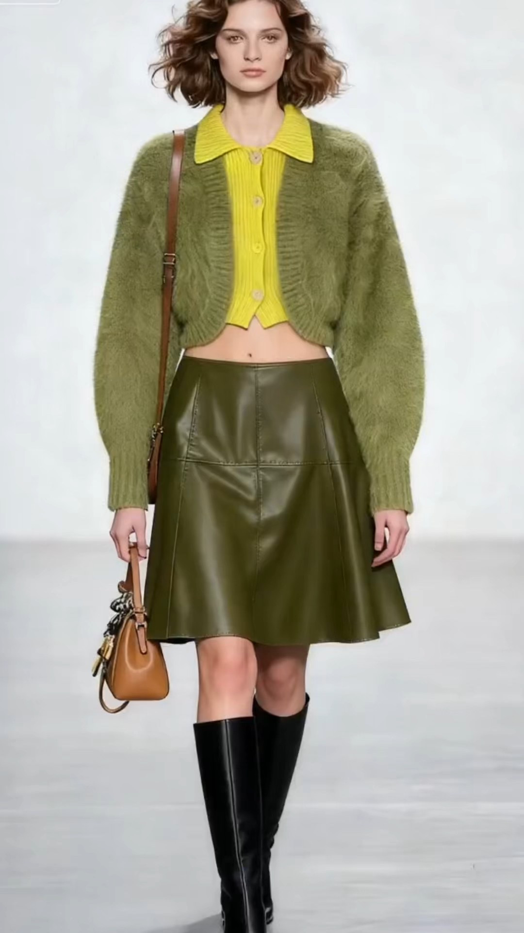 💜 Girls, this has been my go-to fall “fun and flirty” look lately! That fuzzy olive green cropped cardigan is so soft I never want to take it off, and the sunny yellow collared layer underneath adds just the right pop of brightness to cut through the muted tones.
The pleated olive leather skirt gives it a retro 90s vibe, and those sleek black knee-high boots keep it polished—wore this to brunch with friends and got so many DMs asking where I found the cardigan!

#OliveGreenVibes #CroppedCardigan #FallFlirty #RetroSkirt #LTKSeasonal

#LTKootd
