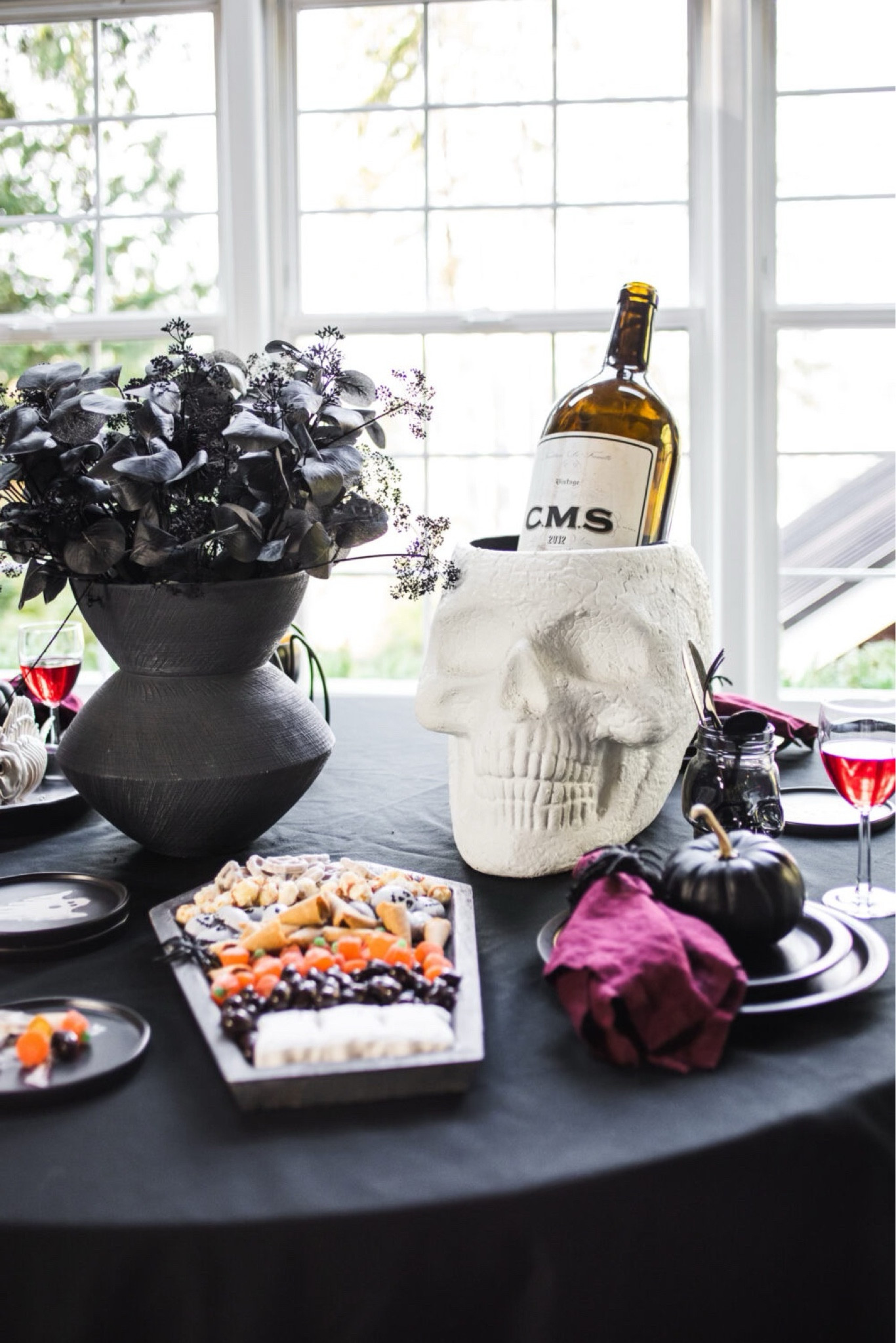 Halloween party table setting! 
Pottery barn skull party bucket 
Spooky treats, black, scratch vase, table decor, holiday, seasonal 

#LTKfindsunder100 #LTKSeasonal #LTKhome