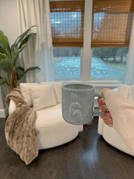 Neutral living room, coastal living room, bamboo blinds, scalloped edge curtains, faux palm tree, swivel boucle chair 

#LTKhome #LTKSeasonal #LTKstyletip