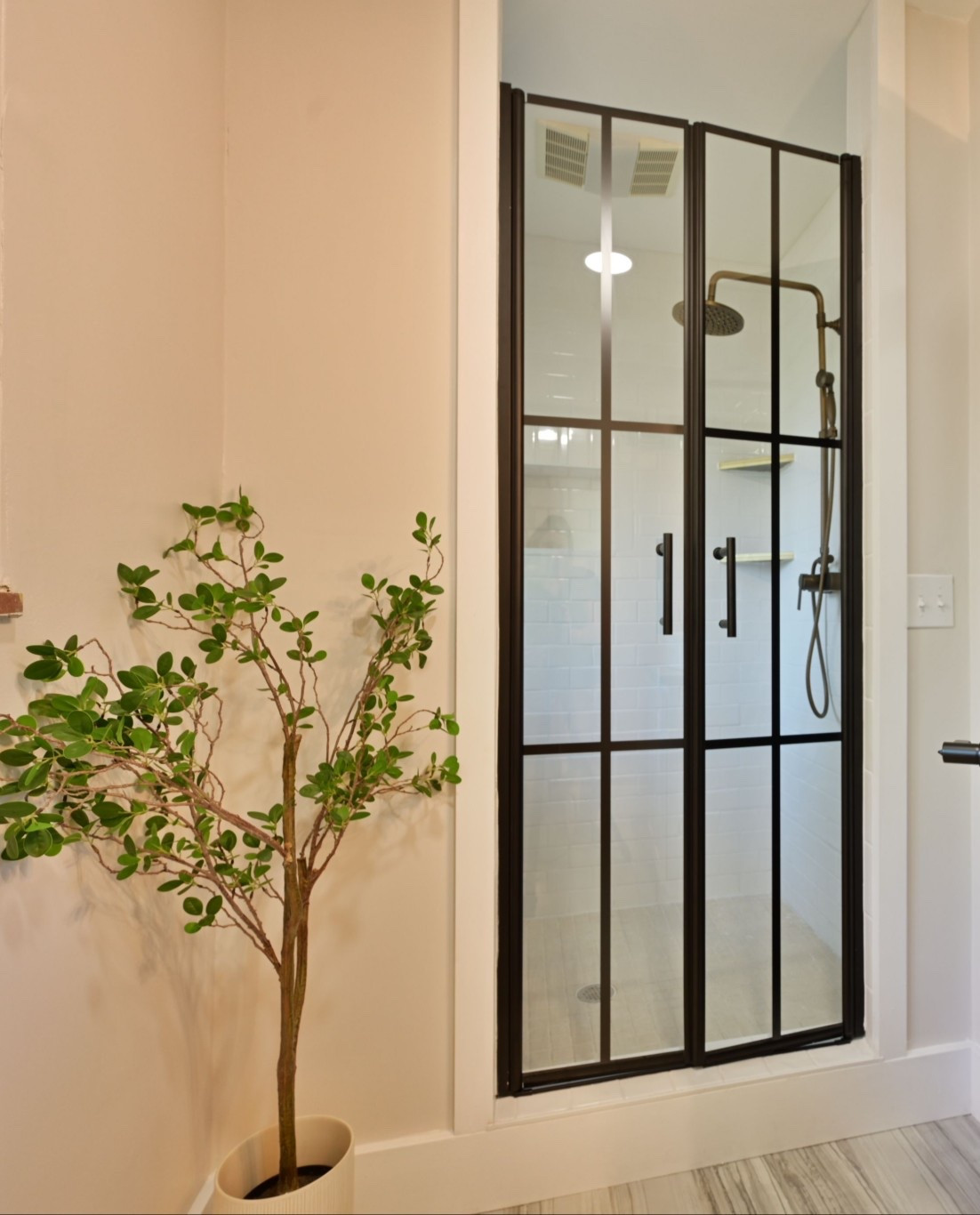 These grid shower glass doors are perfect for small spaces and budget friendly! I love how much they elevate this bathroom 

#LTKSaleAlert #LTKHome