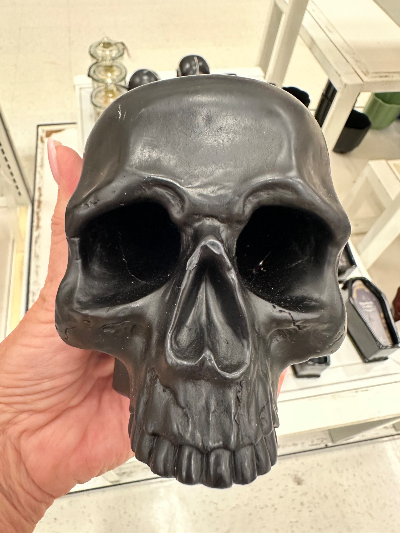 Black skull candle for Halloween 

#LTKHome #LTKStyleTip #LTKSeasonal