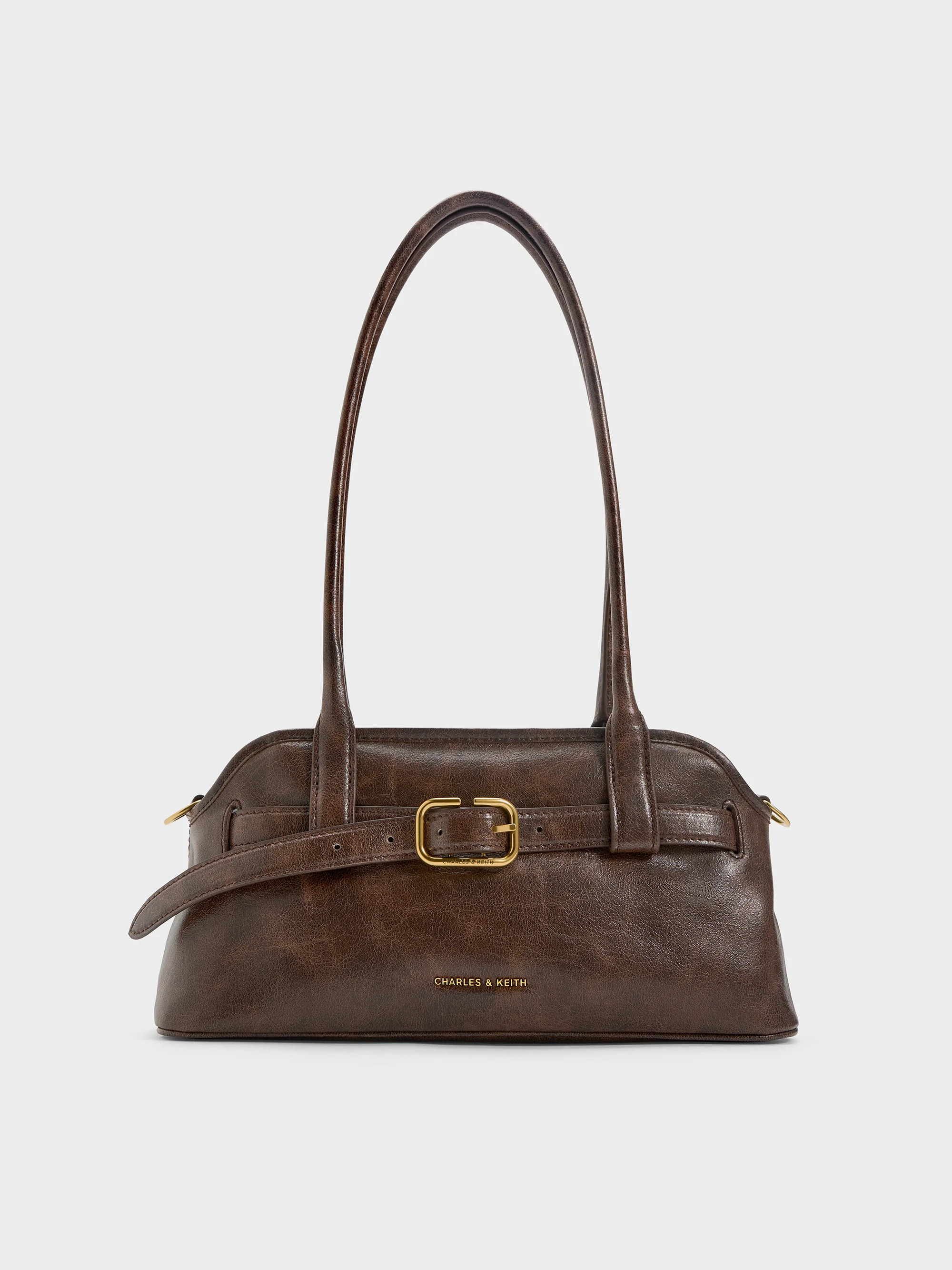 Victoria Belted Elongated Shoulder Bag
    
         - Distressed Coffee | Charles & Keith US