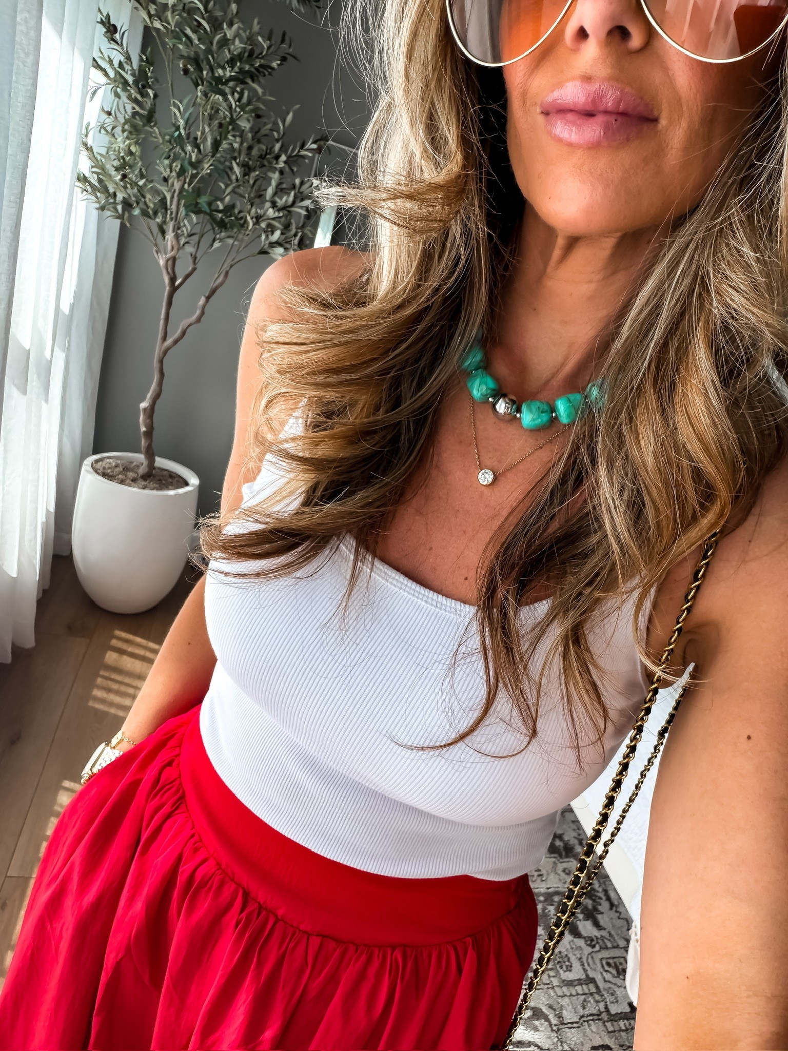 This red skirt and tank combo is one of my favorite summer outfits. The statement turquoise necklace adds the perfect pop of color and makes the whole look feel unique. Easy, comfortable, and perfect for everything from brunch to summer events.

red tank top, red skirt outfit, turquoise necklace, statement jewelry, summer outfit ideas, colorful accessories, vacation outfit, casual chic style, summer fashion, everyday style, resort wear, trendy outfit, themominstyle

#LTKootd #LTKSeasonal #LTKTravel