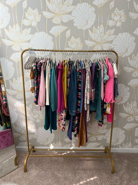 My office is finally coming together. This wallpaper is amazing!!!! I absolutely love the little rack from Amazon & of course, I am in love with our children’s clothes 💕 

annastowe.findingfoxtale.com

#findingfoxtale #office #gold #childrensclothes 

#LTKhome #LTKkids #LTKFind