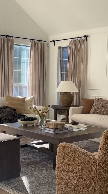 ATM Living Room in Motion // Earthy Neutral Living Room 

living room inspiration, earthy living room, neutral living room, curtains, pinch pleat curtains, art, living room art, coffee table styling, boucle chair, accent chair, mcgee & co, amber interiors 

#LTKHome #LTKVideo #LTKStyleTip
