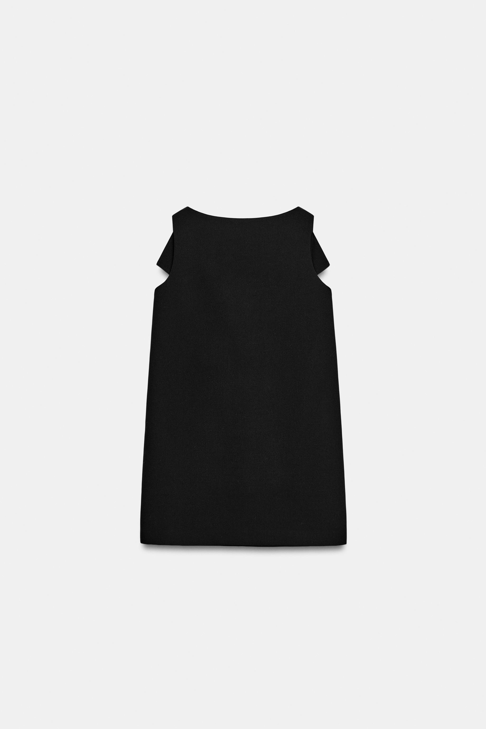ZARA WOMAN COLLECTIONDress made of a viscose blend yarn. Round neck and sleeveless. Open back det... | Zara US