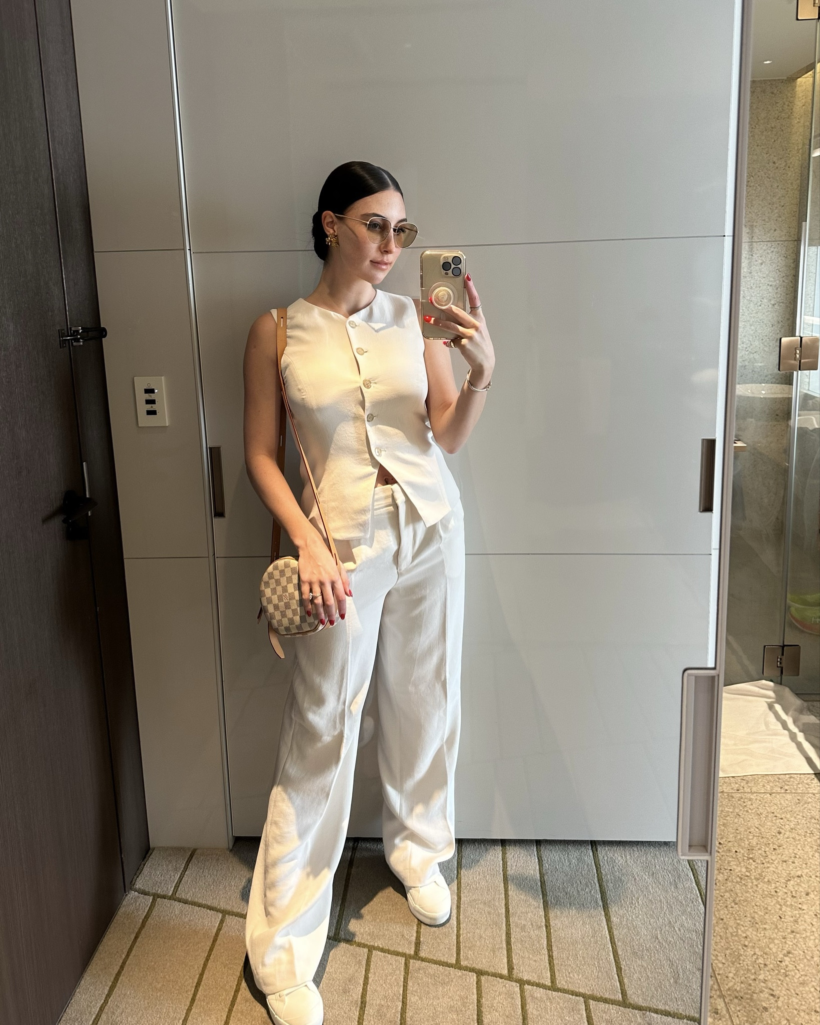 This is a lined button-up vest with princess seams for shaping. It’s expertly tailored with Crepette™ (as are the pants) — Aritzia’s one-of-a-kind Japanese crepe fabric beloved for its subtle texture, breezy drape and the fact that it basically never wrinkles. Perfect for travel and may weather in Japan. 

Also I swear by these Dr. Scholls shoes for travel and walking.

#LTKTravel #LTKShoeCrush #LTKStyleTip