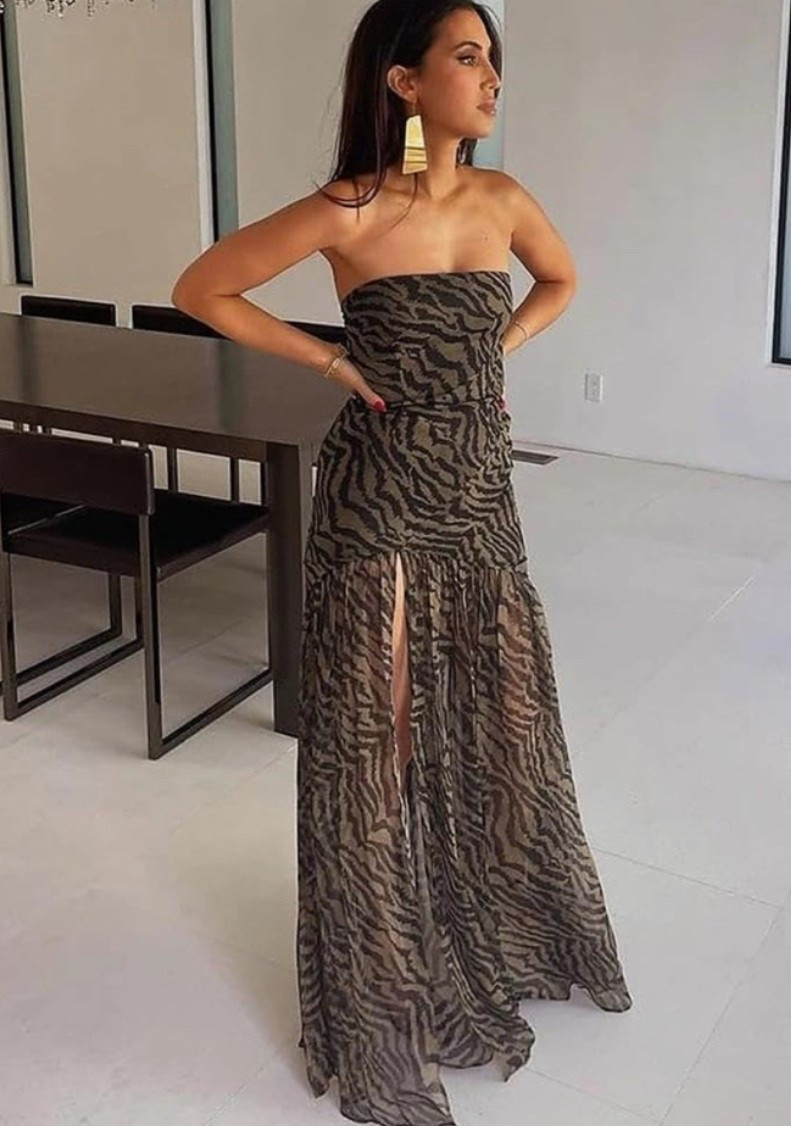 Tiger stripe strapless maxi dress with that wild, sexy, city-chic energy that instantly feels bold and unforgettable. 🖤 Perfect for a beach vacation, rooftop dinner, art exhibit, gala, wedding guest look, cocktail hour, or any night you want the outfit to feel dramatic and elevated. The mesh patchwork, high slit, and strapless shape give it that fierce statement look while still feeling sleek and feminine. 

Grab this dress if your closet needs a bold vacation-to-evening piece that turns the whole room into the moment. 🐅

#LTKWedding #LTKSeasonal #LTKBeauty