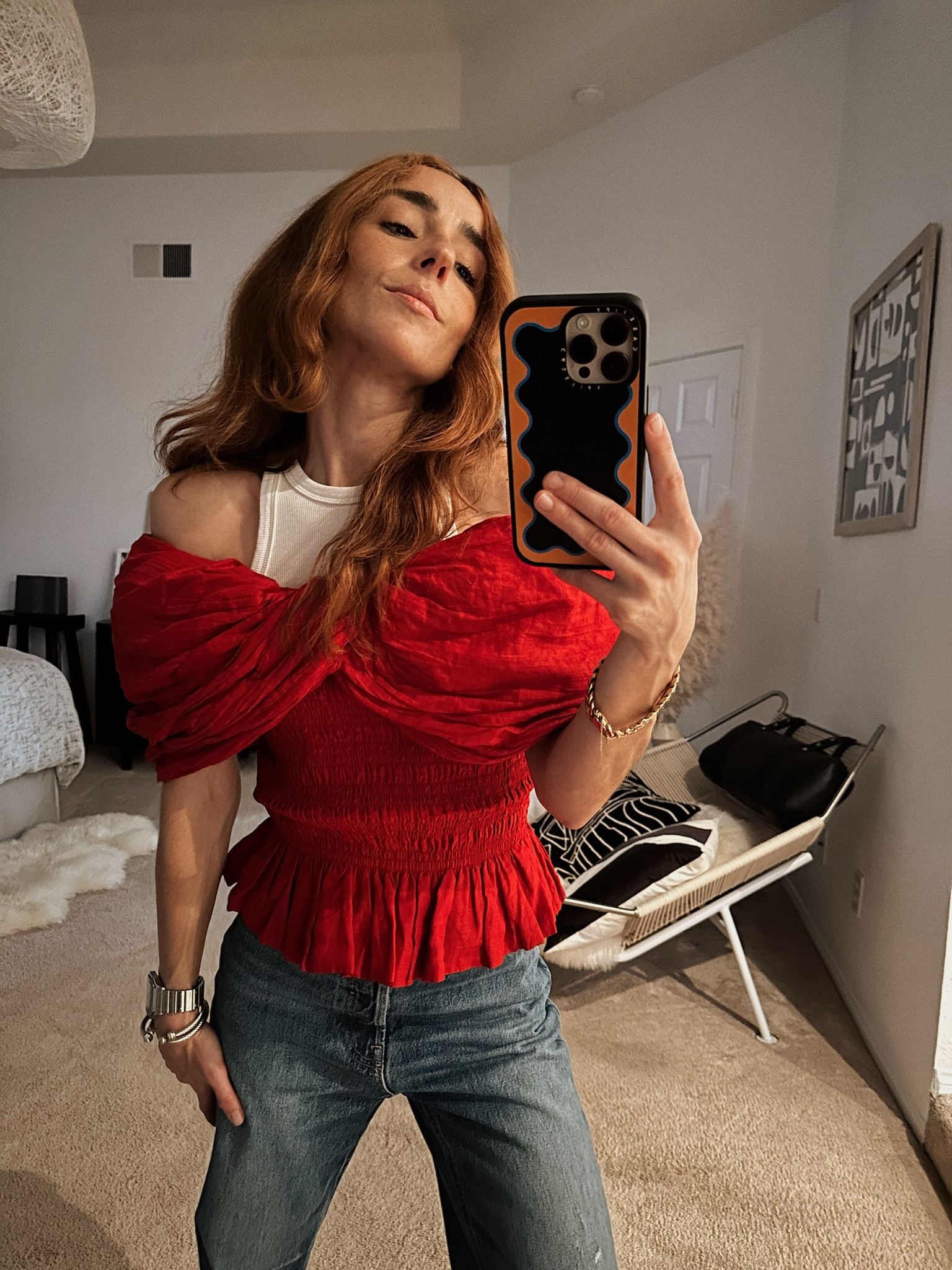 Tones of red for now and the upcoming holidays. This romantic top is perfect dressed up or more casual by layering over a ribbed tank top. Paired with sleek ballet flats and you have a winning statement look. 

#LTKHoliday #LTKstyletip #LTKSeasonal