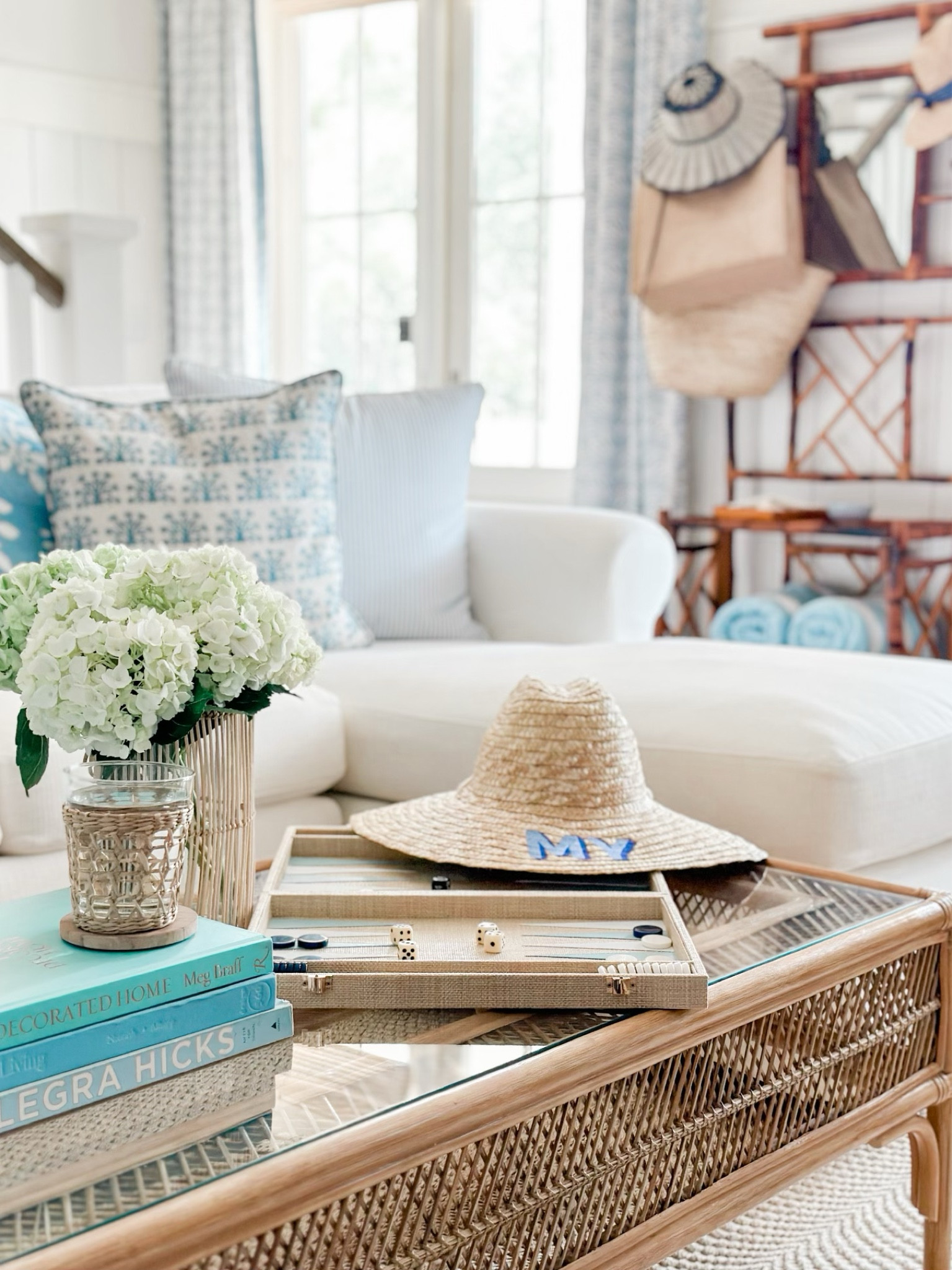 Blue and white, beachhouse decor, coastal decor, society social, serena and lily, rattan, bamboo hall tree, Mark and Graham, backgammon, raffia, board games, hydrangeas, block print pillow, Cailini Coastal, sun hat, straw hat, summer, Lorna Murray, monogram hat, coffee table books, Margaret of York, Cove Hollow House 

#LTKhome