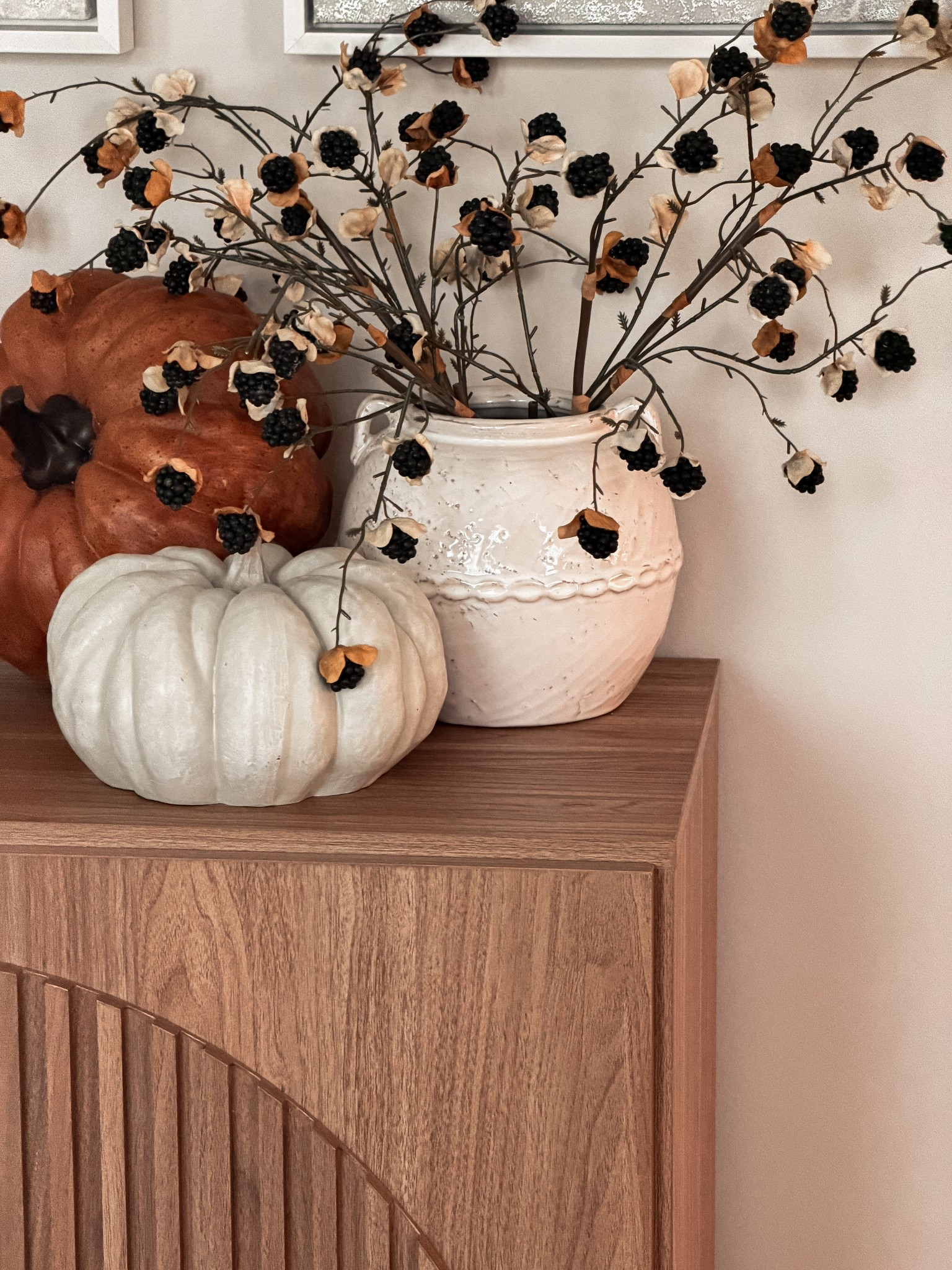 Shop this Fall look. My exact pumpkin & stems were a hobby lobby find. 

McGee Vase // Faux Pumpkins // Dried stems // Fall Stems 

#LTKHome #LTKHalloween #LTKSeasonal