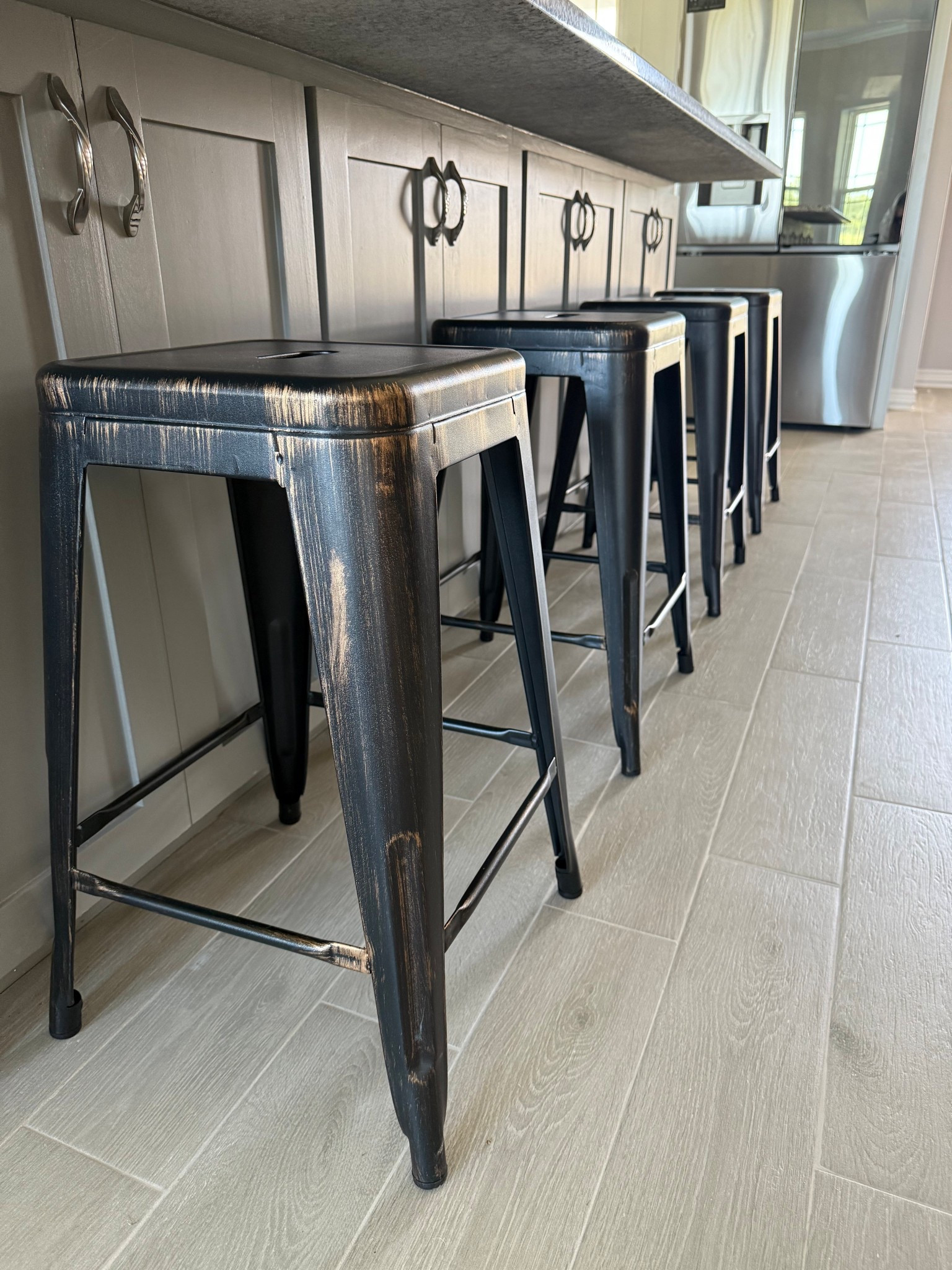 Simple functional distressed barstools 

#LTKHome