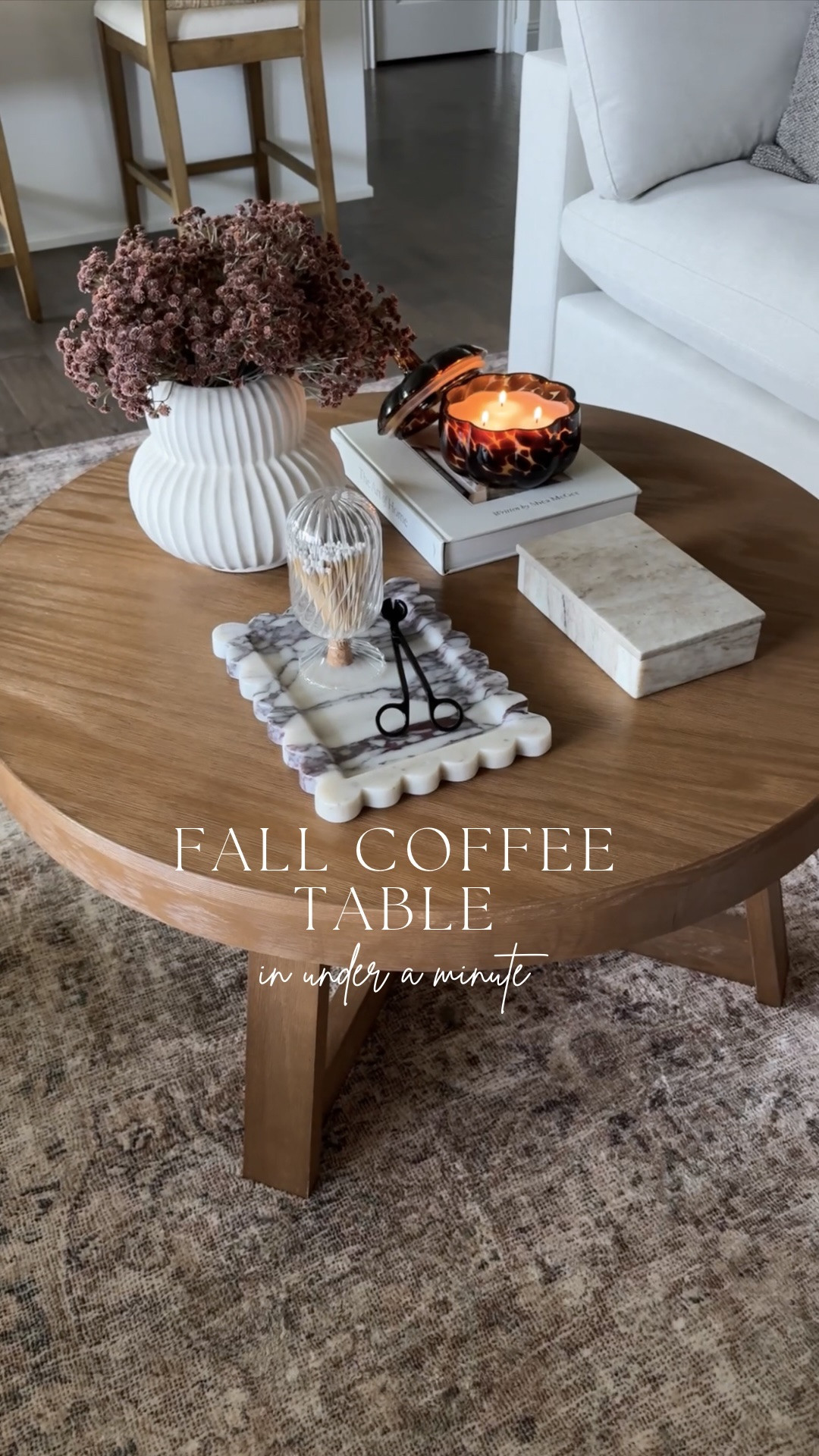 A fall coffee table refresh in under a minute 🍂 A simple floral swap, a pumpkin candle, and a little rearranging were all it took to give this space an easy seasonal update.

#LTKHome #LTKSeasonal