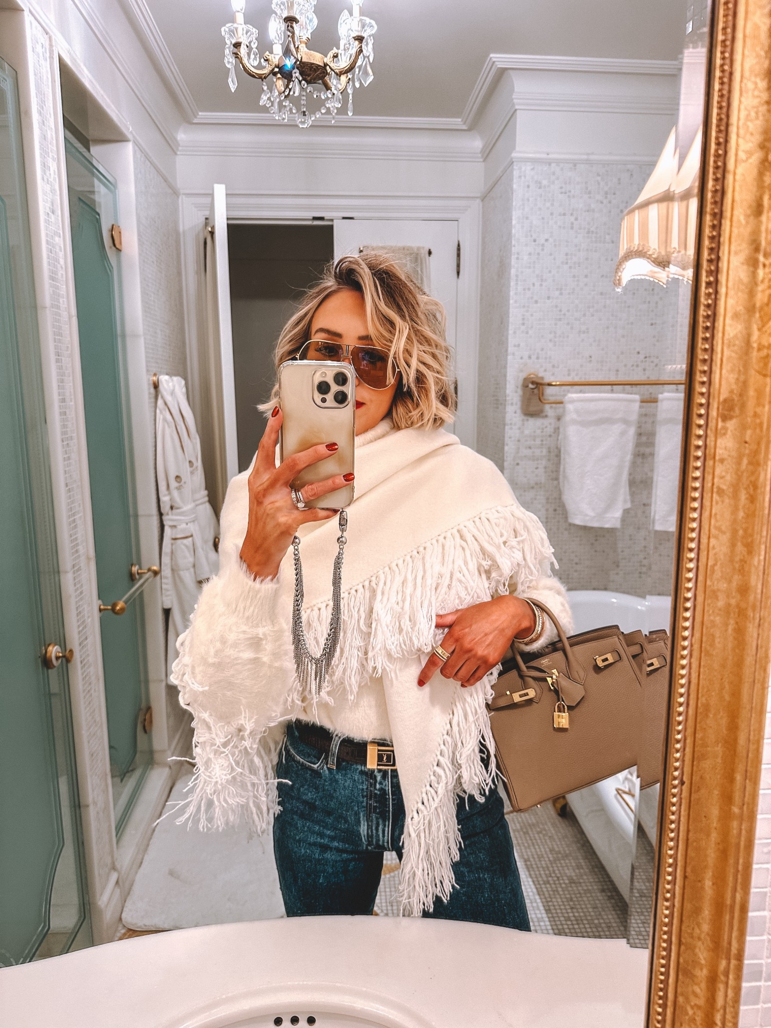 This amazing fringe cape/scarf was just restocked! I’m in a medium for reference. The perfect winter chic layer and I love the fringe 😍😍😍