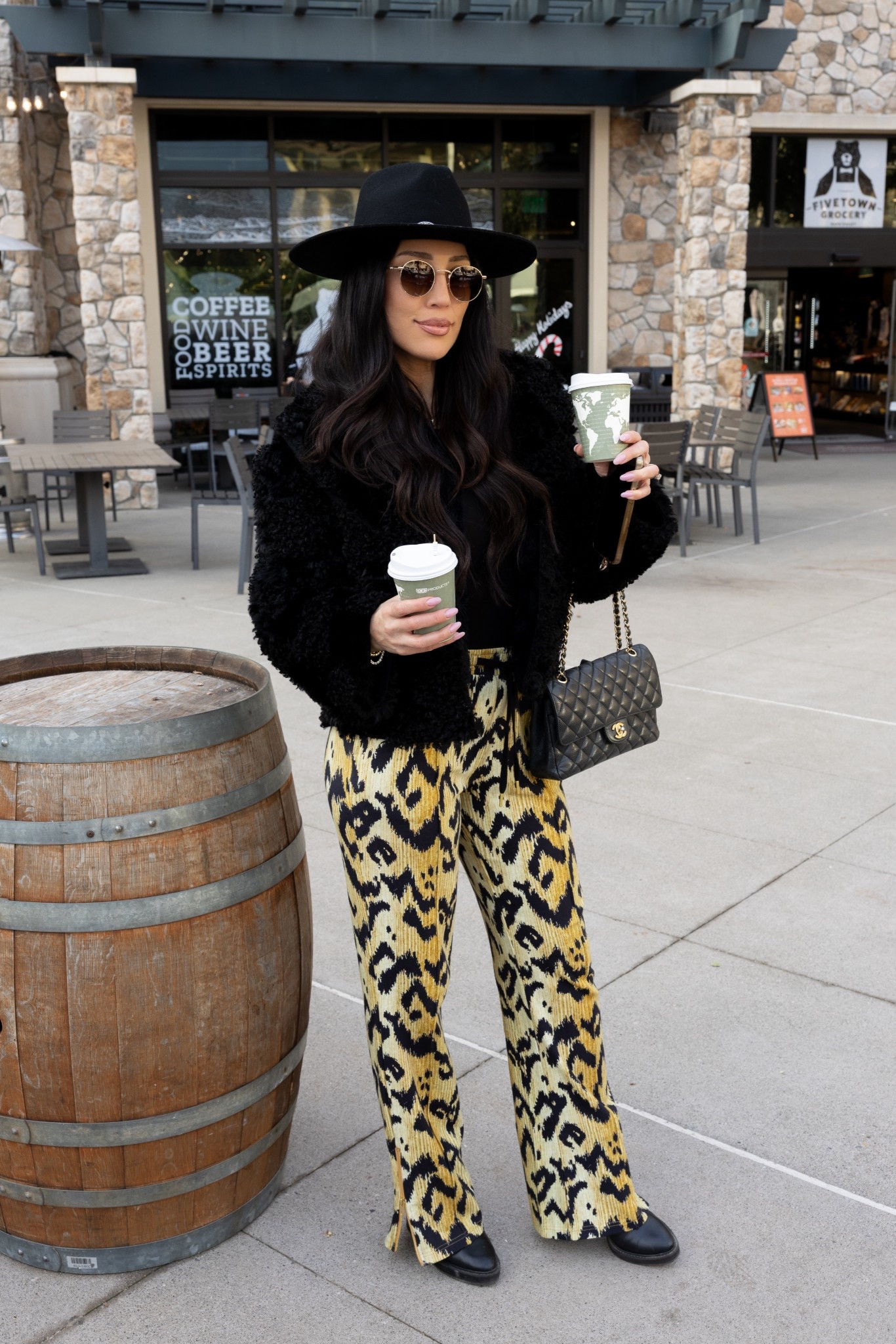 Cozy winter outfit for wine country mornings ☕️🐆✨
Wearing my favorite tiger print pants with a black faux-fur jacket, a wide-brim hat, and classic black boots. Such an easy winter travel outfit that feels comfy but still chic. This look is perfect for Napa outfits, Sonoma wine tasting style, or any cold-weather vacation outfit where you want a little statement moment.

Everything I’m wearing is linked on my LTK — including the animal print pants, winter coat, hat, boots, and Chanel bag.

winter outfit, cozy outfit, chic travel outfit, wine country outfit, wine tasting outfit, Napa style, leopard pants outfit, animal print outfit, winter wardrobe essentials, holiday travel style, LTK fashion finds.

#LTKHoliday #LTKSeasonal #LTKootd