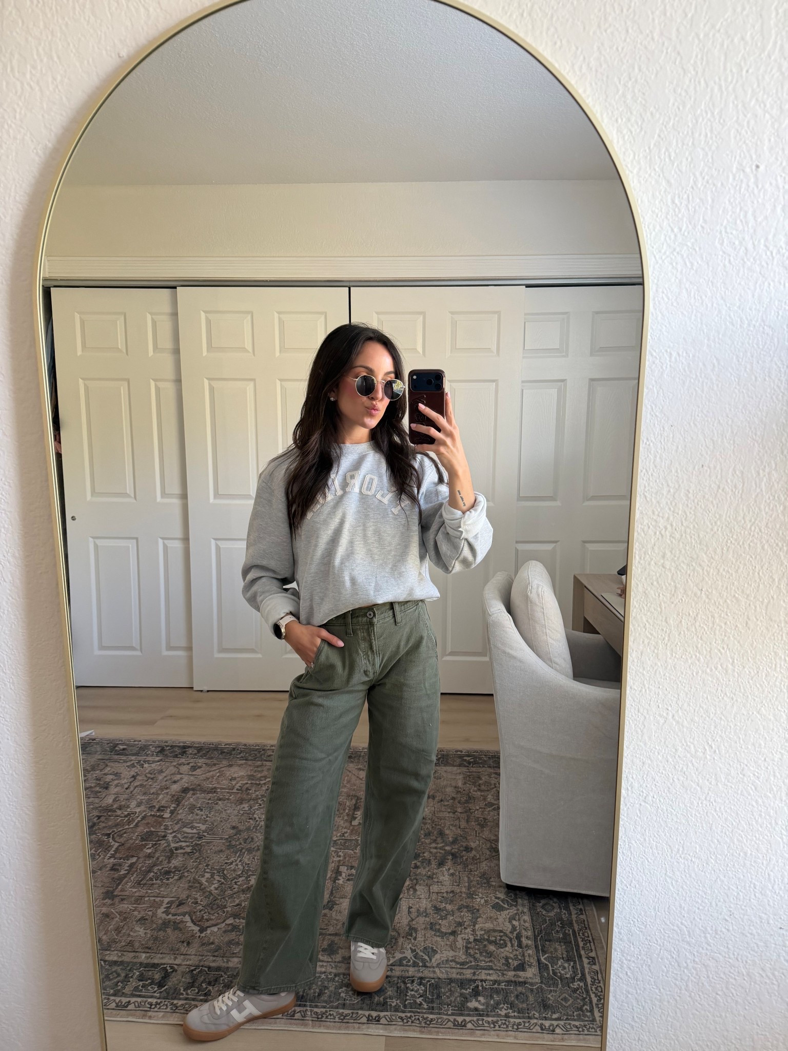 Casual spring outfit idea with an oversized crewneck styled multiple ways. spring outfits 2026 casual, oversized crewneck outfit, barrel jeans outfit, sneakers outfit women, neutral outfit ideas, comfy chic outfits, airport outfit ideas, everyday outfit inspo, minimal style outfits 

#LTKootd #LTKSeasonal #LTKgrwm