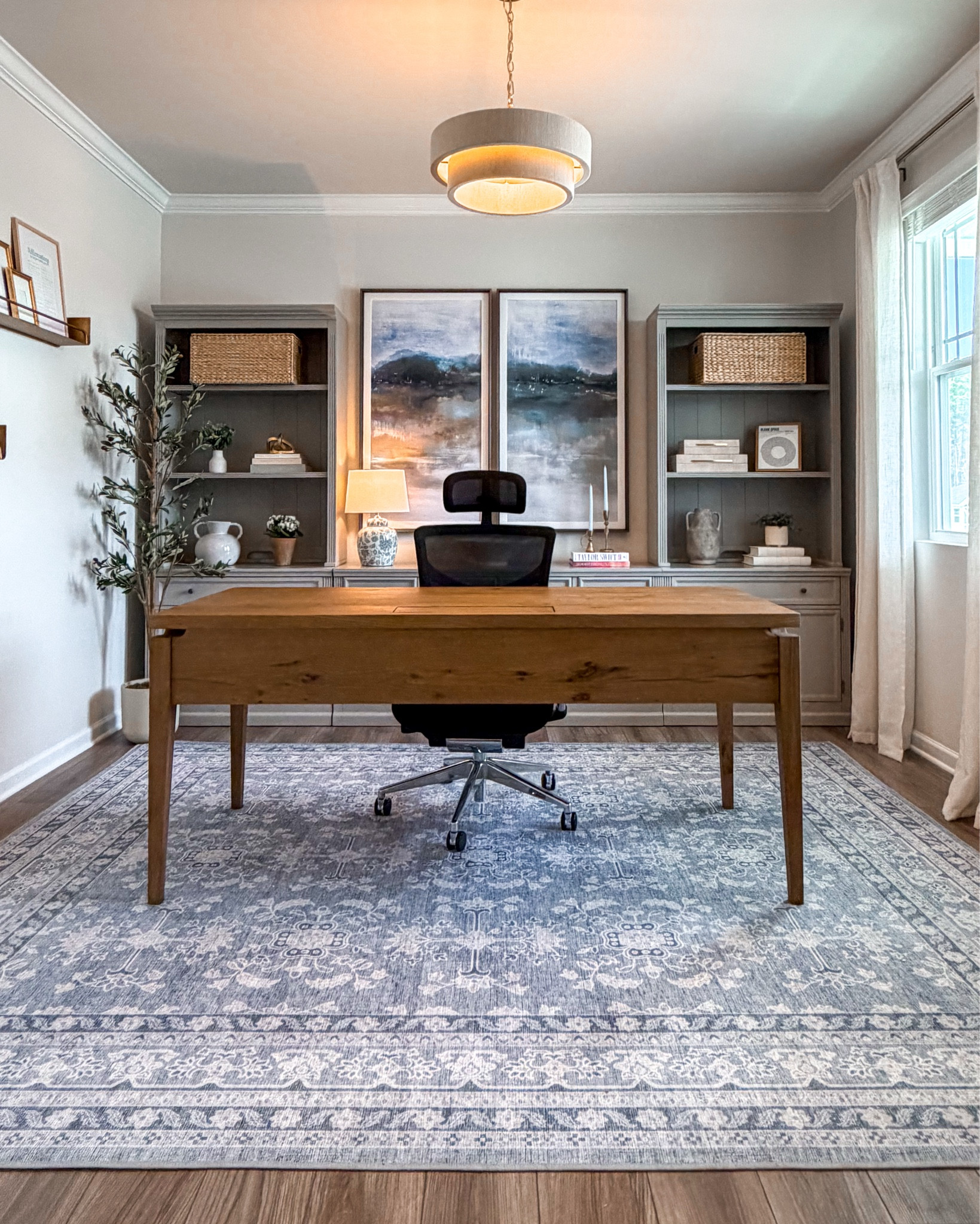 Light blue, airy, and designed to make work feel a little less… work. 🤍
This office layers soft neutrals, warm wood tones, and subtle texture for a space that feels calm but elevated. 

#LTKdayinmylife #LTKWorkwear #LTKHome
