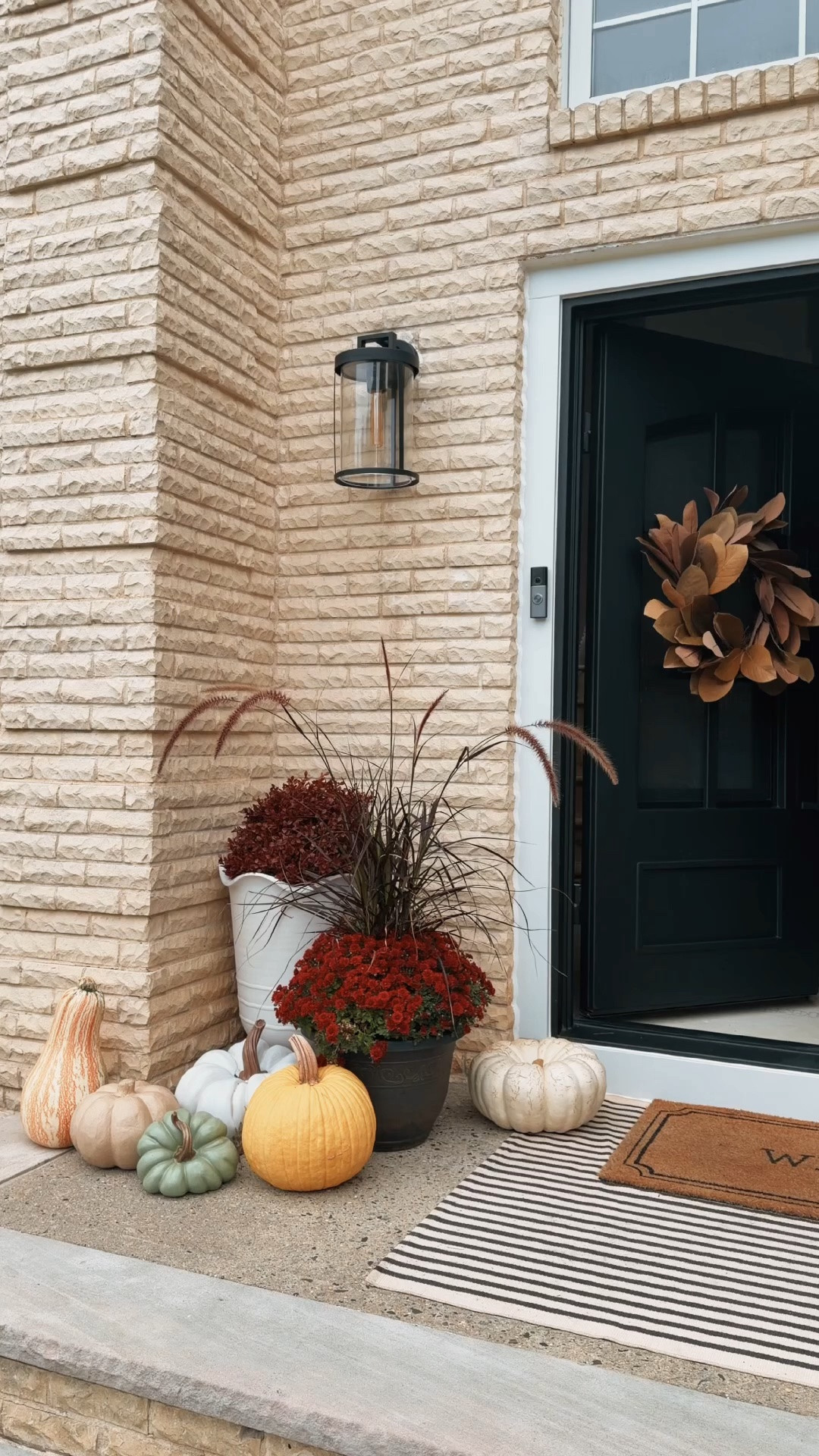 my first fall porch is almost ready! 🍂🎃🤎mixed some faux mums + faux pumpkins with real ones… so wish me luck because I’m officially pretending I know what I’m doing 

fall porch, porch idea, easy porch styling, faux outdoor, fall wreath, door wreath, fall decor, fall centerpieces, fall front porch decor, fall porch rug, fall porch doormat

#LTKSeasonal #LTKHome #LTKstorytime