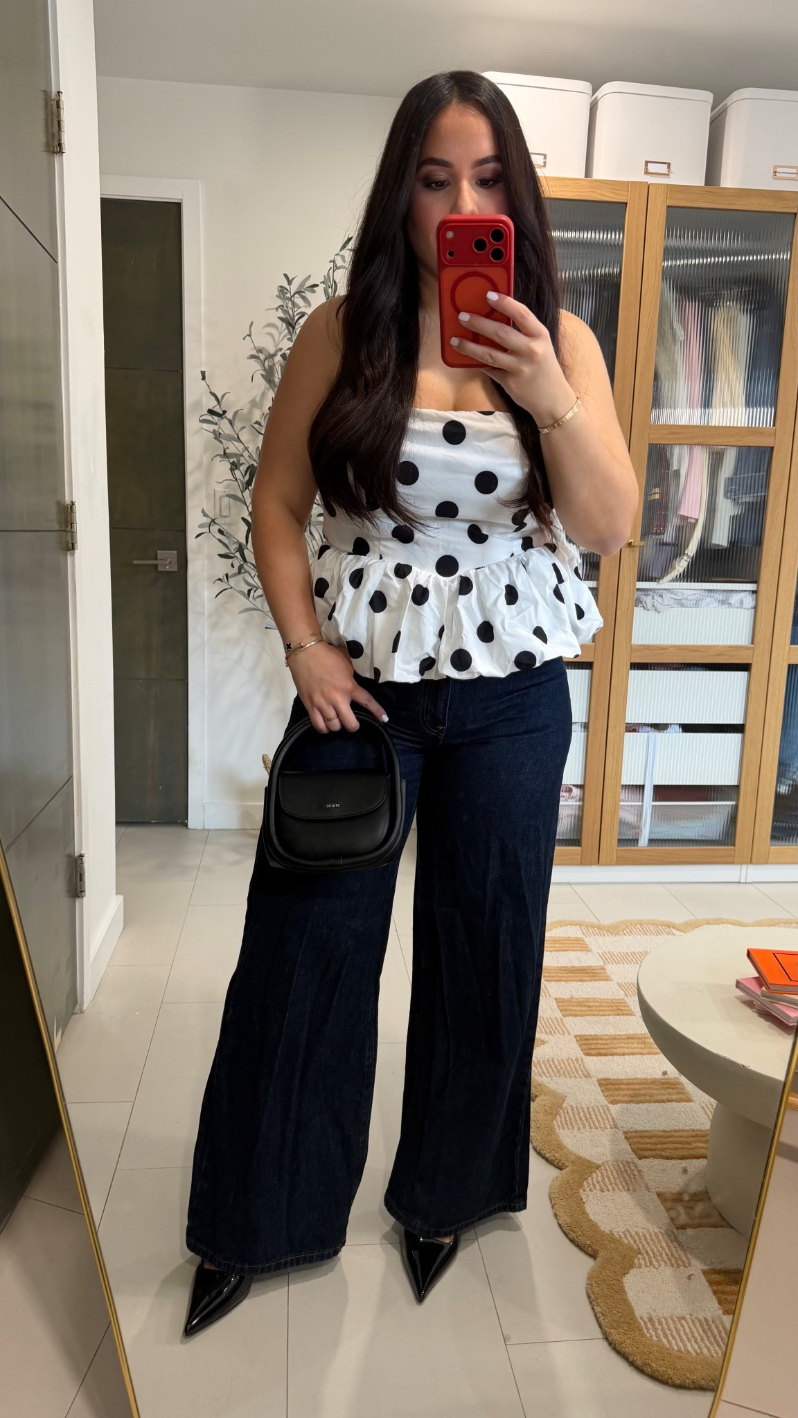 Week of styling polka dots — trending for a reason! This outfit is classic, flirty, and surprisingly easy to dress up or down. This top + wide-leg denim combo is giving effortless but put-together 🫶🏼 

Top: L // Jeans: 30 

#LTKMidsize #LTKValentine #LTKootd